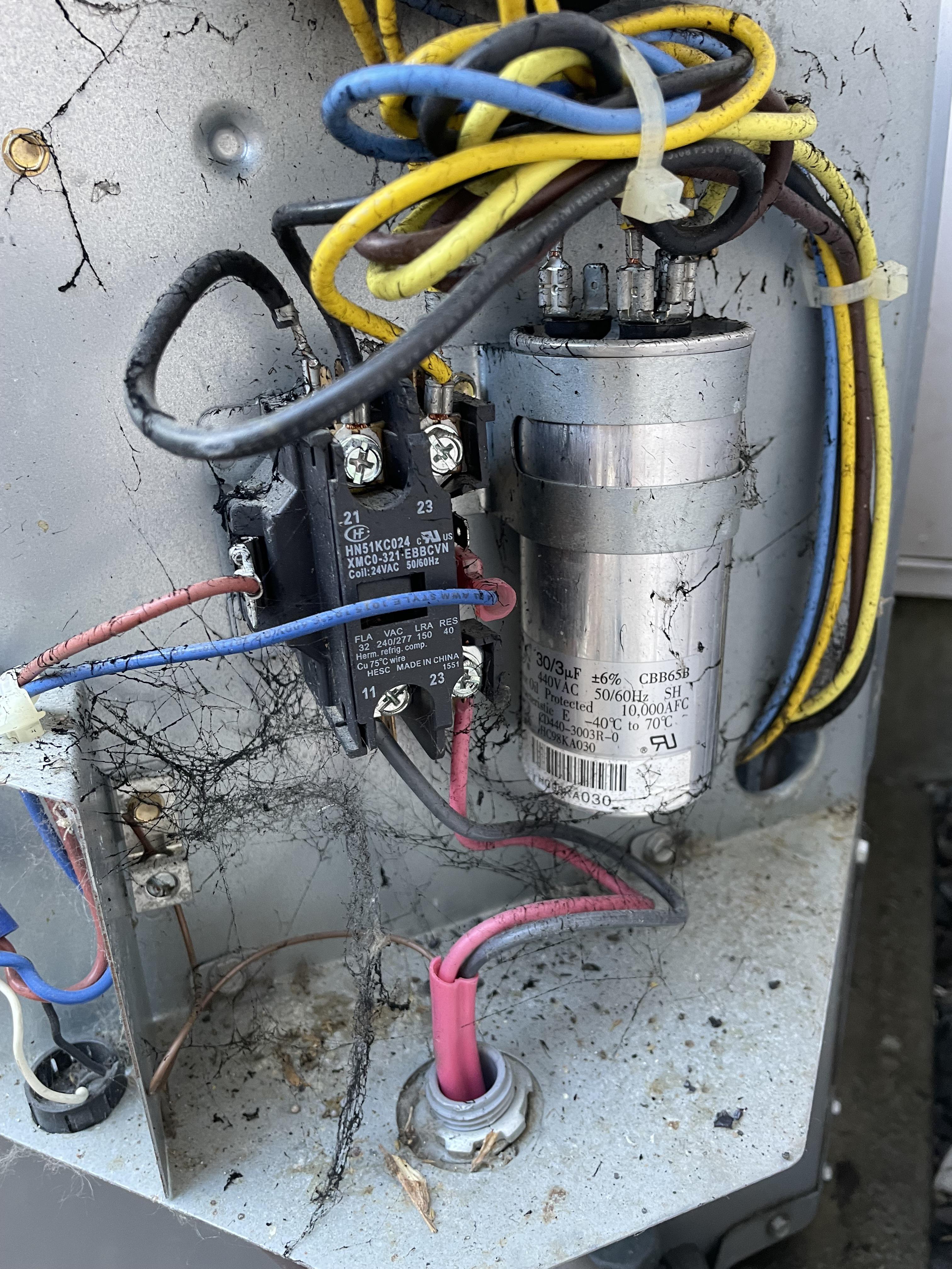 AC compressor tries to start and fails, but the fan runs fine. Opened