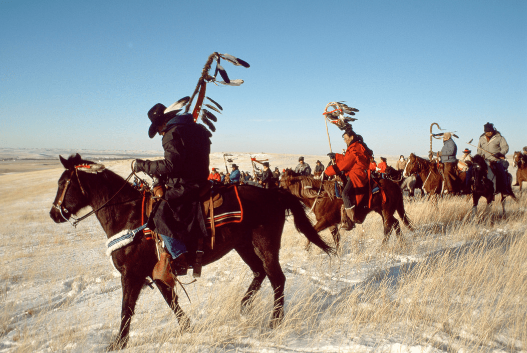 American Indians travel to the graves at Wounded Knee to mark one