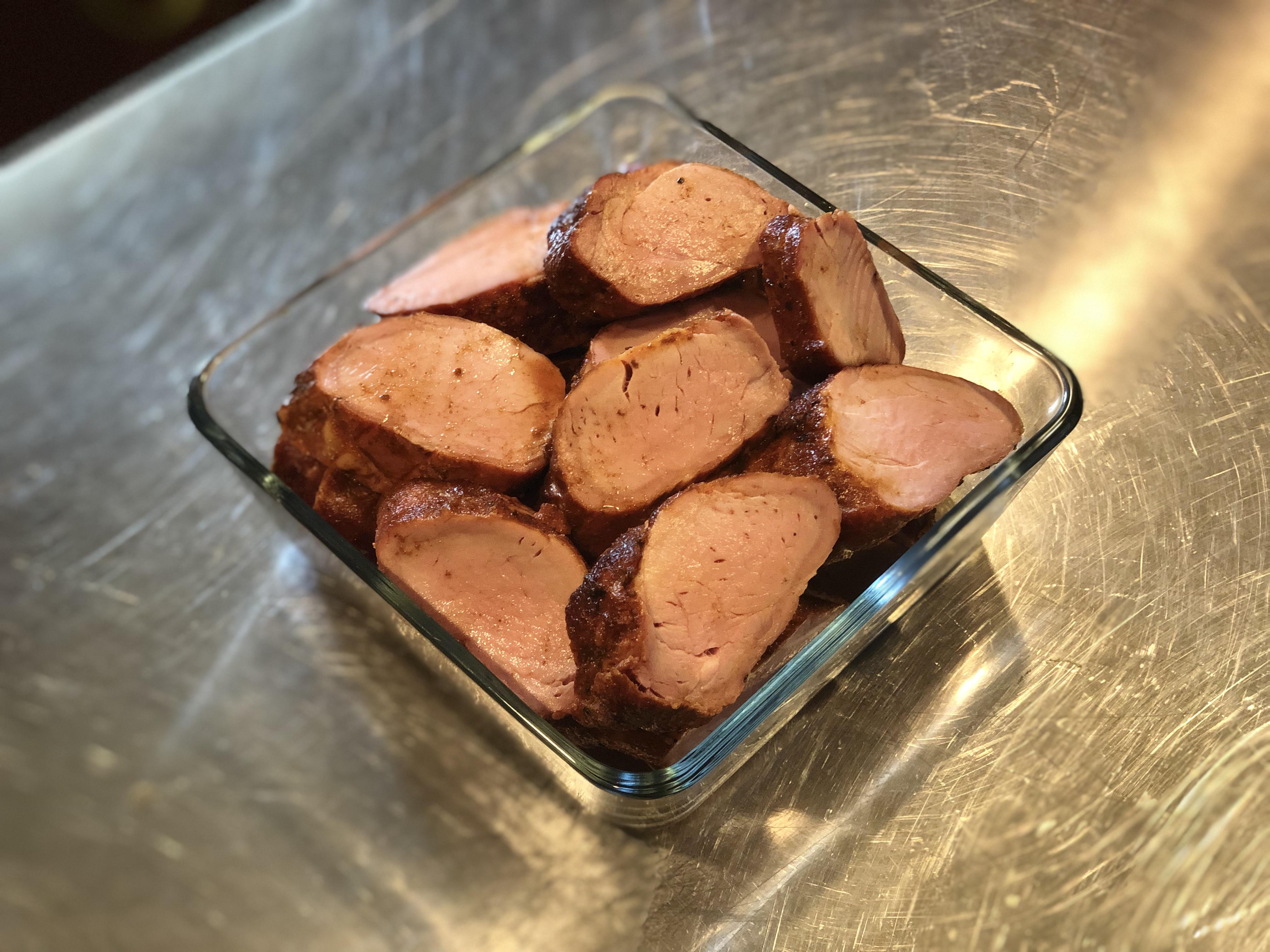 Pork tenderloin rubbed with Meat Church Honey Hog smoked over cherry