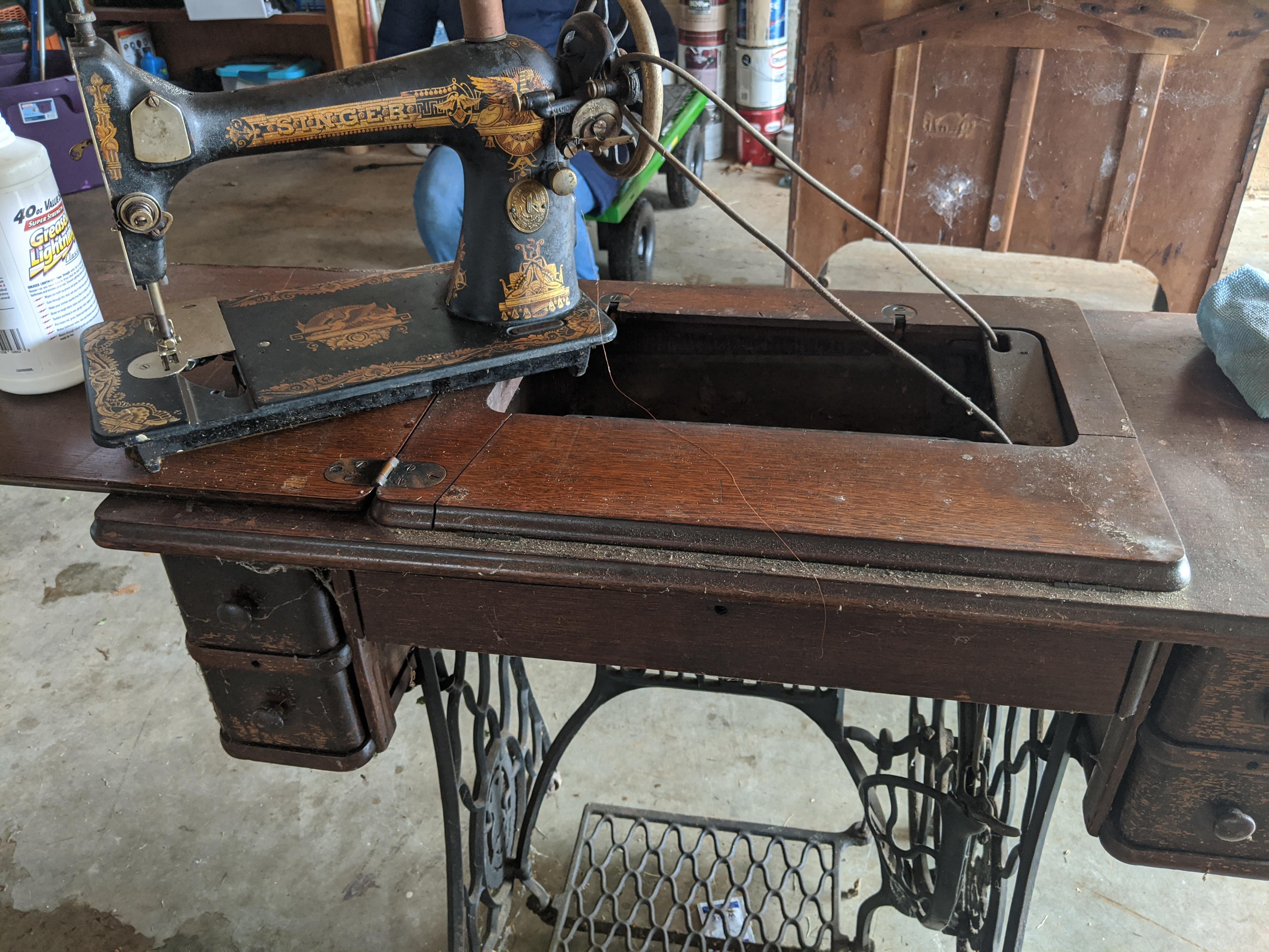 Found this old Singer Sphinx sewing machine and desk in my dad's shed