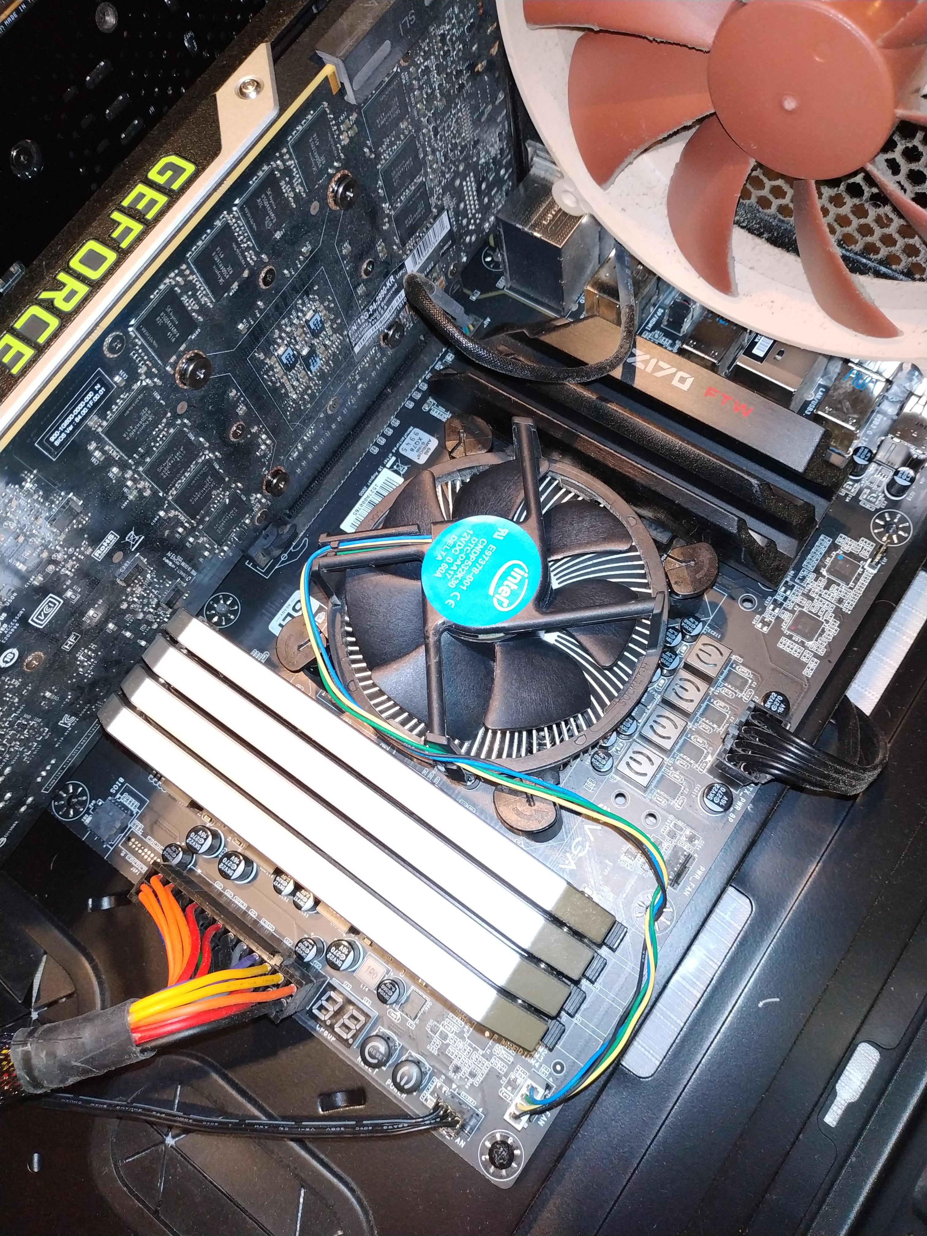 My friend's rig. GTX Titan X, Dominator Platinum, and a stock Intel heatsink r/techsupportgore