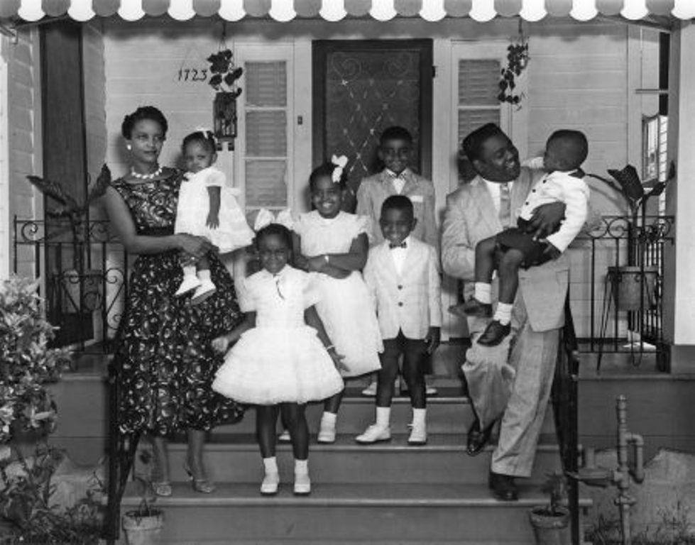 Antoine 'Fats' Domino, wife Rosemary, and six kids at home in the lower