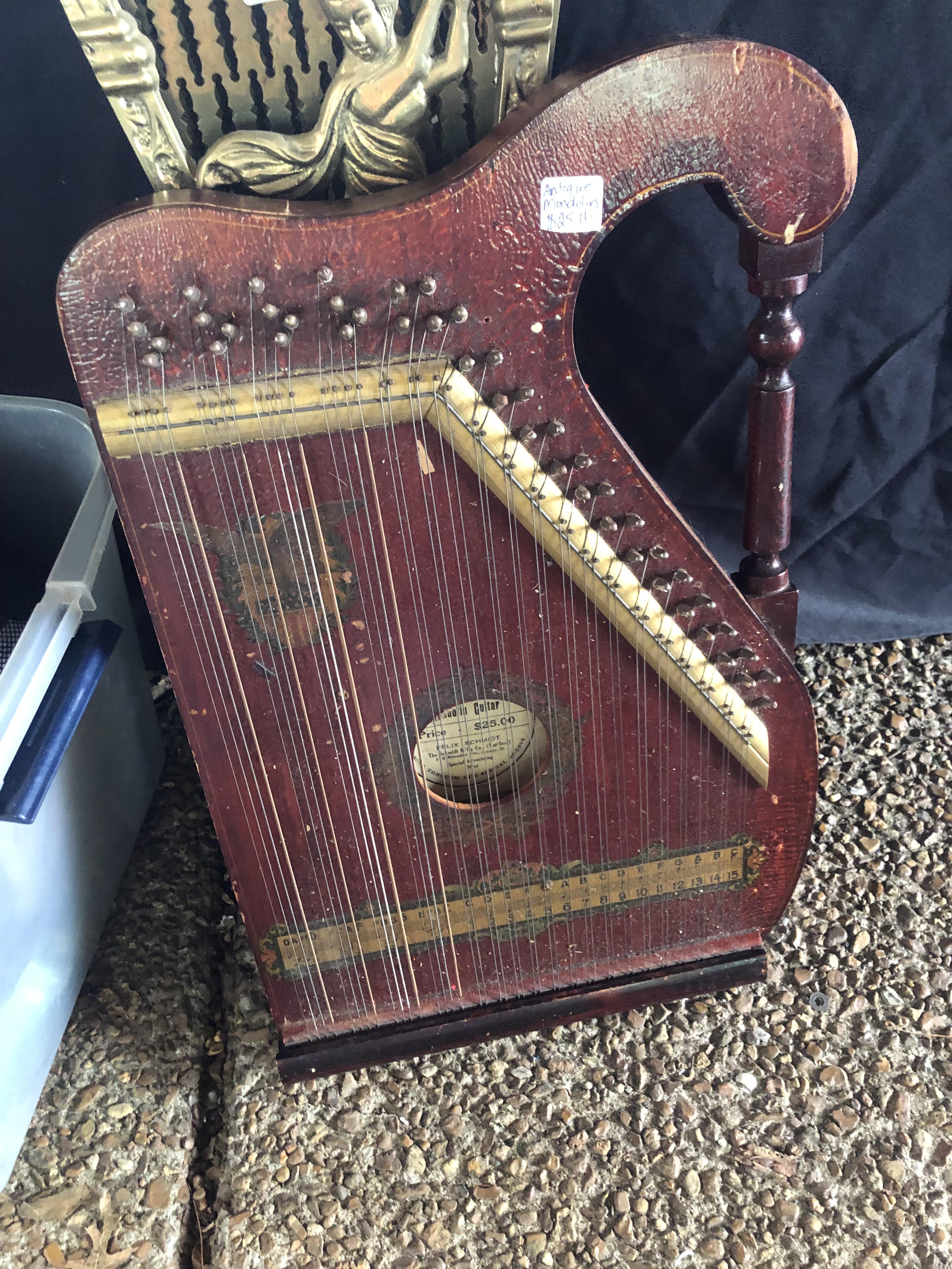 Is this antique mandolin worth anything r/mandolin