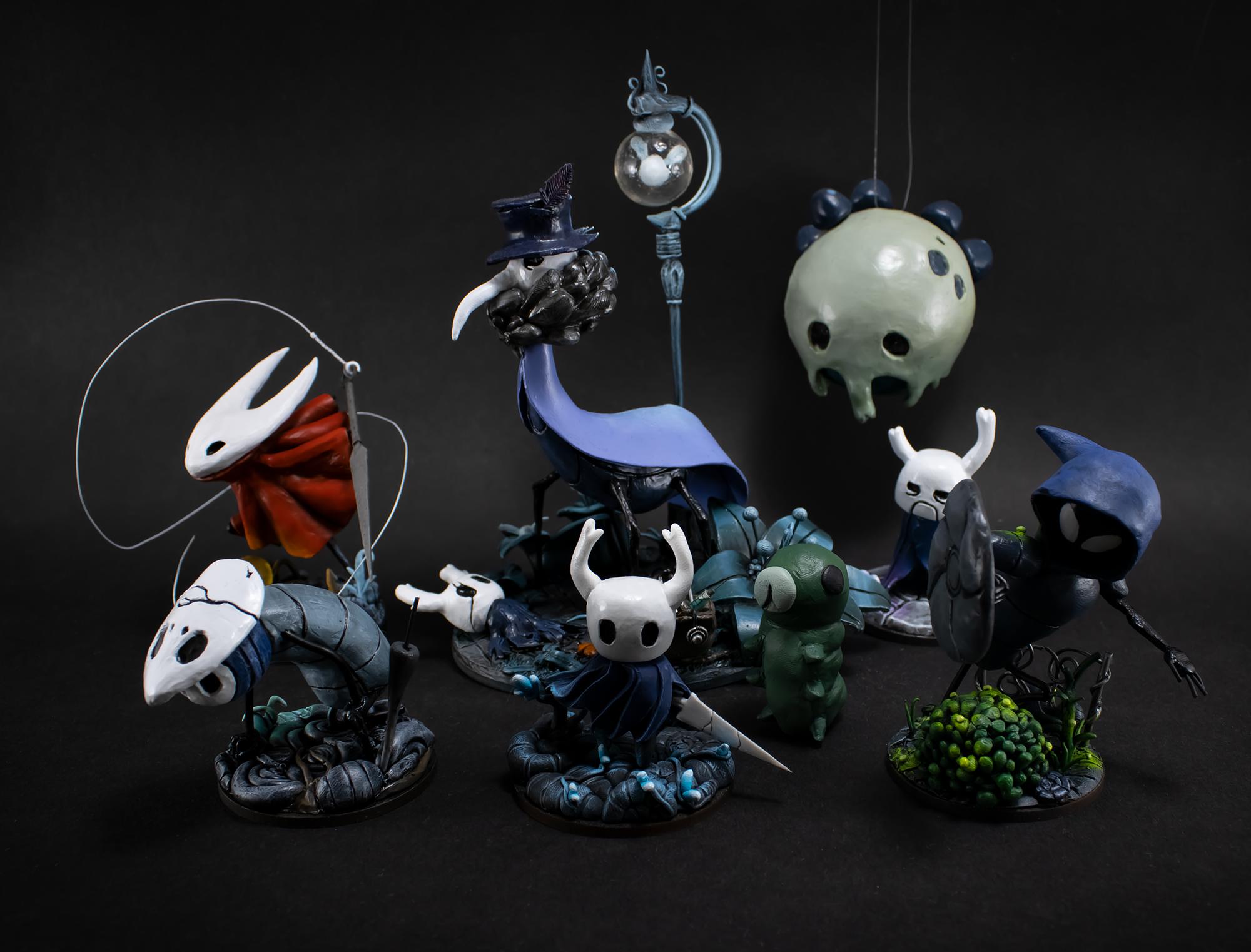 A small family photo of all Hollow Knight figures I've sculpted since I