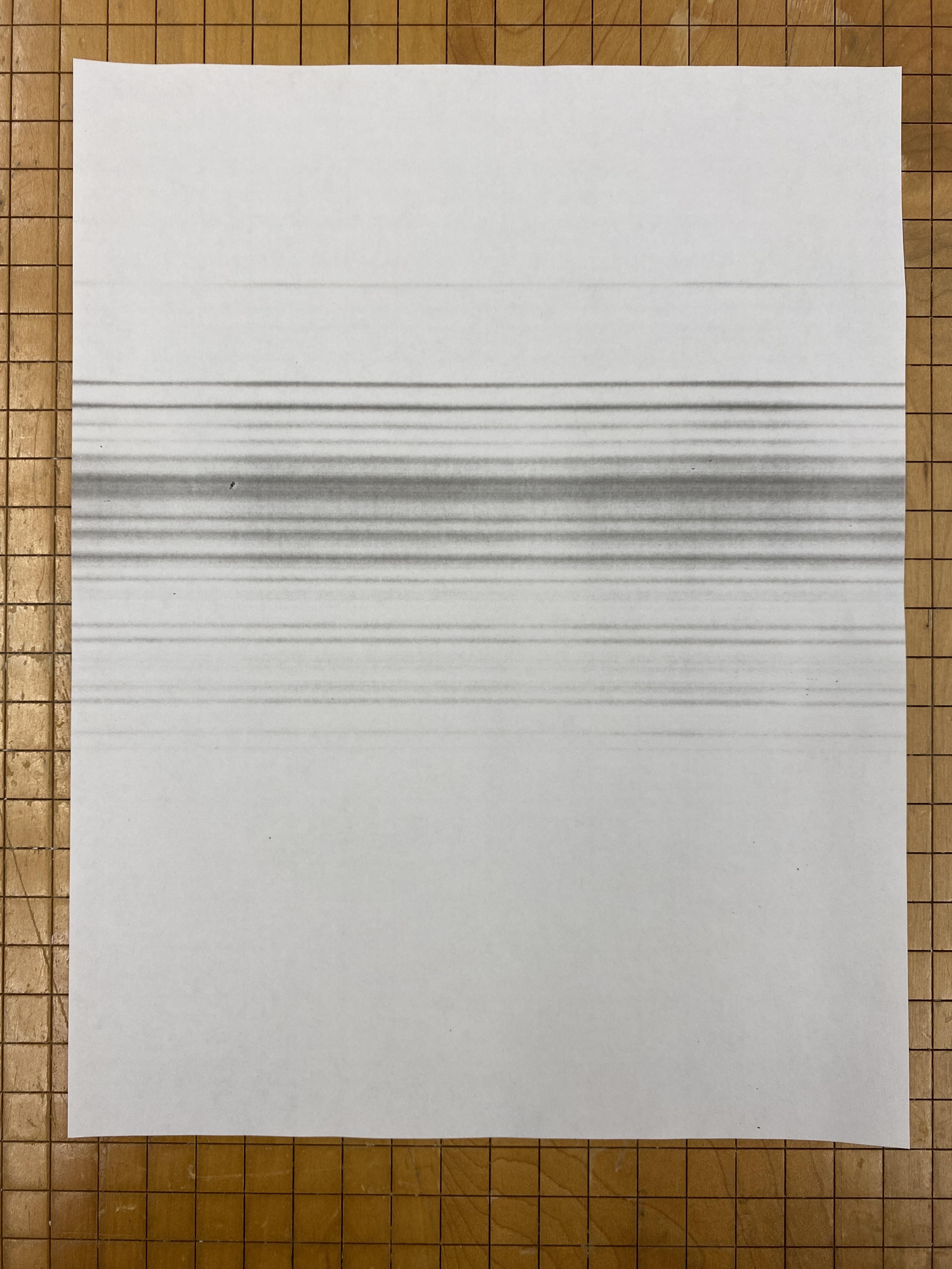 Why are these black streaks appearing on copies and prints? I’ve