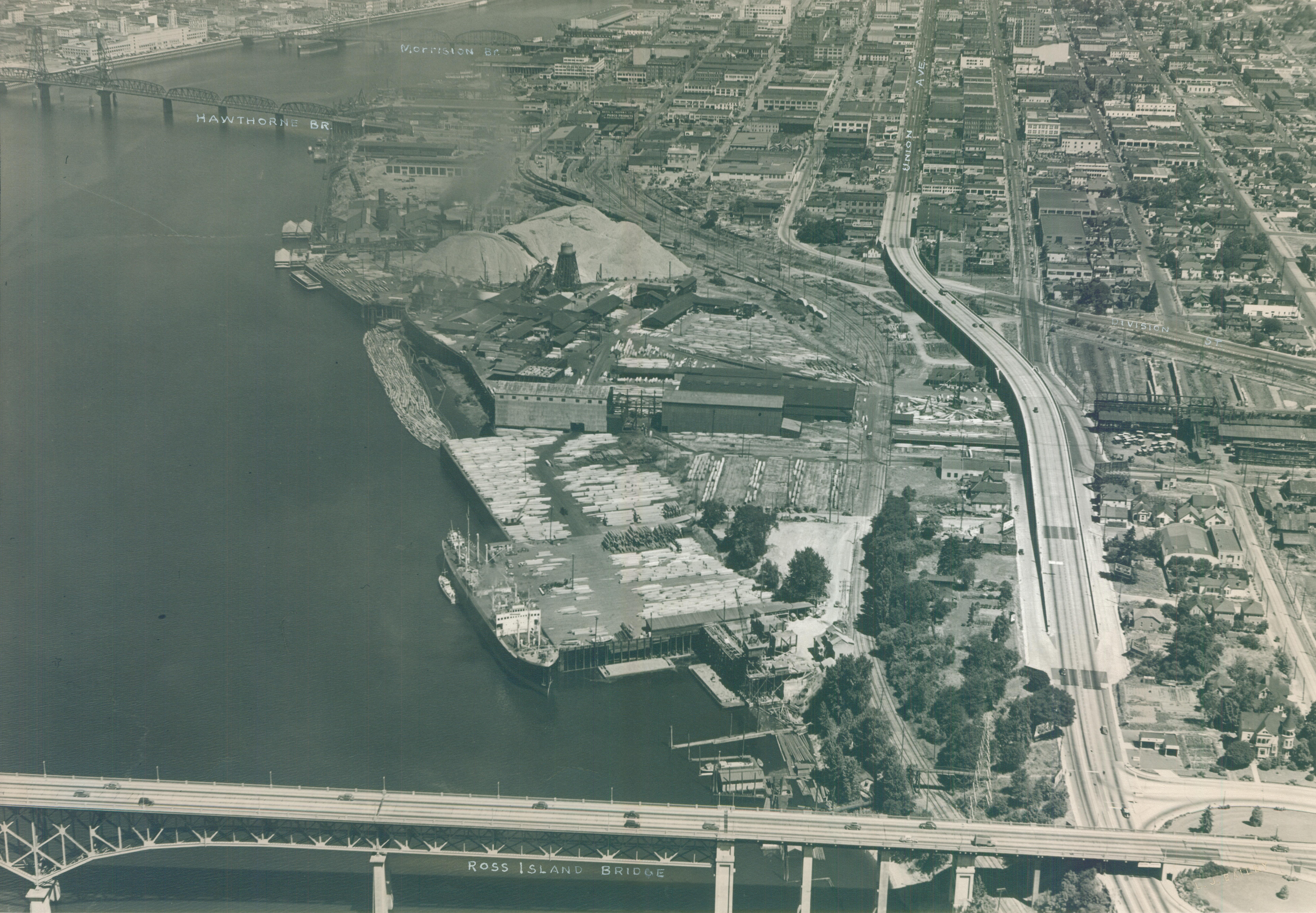 Aerial view of SE waterfront from Ross Island to Morrison Bridges, 1940