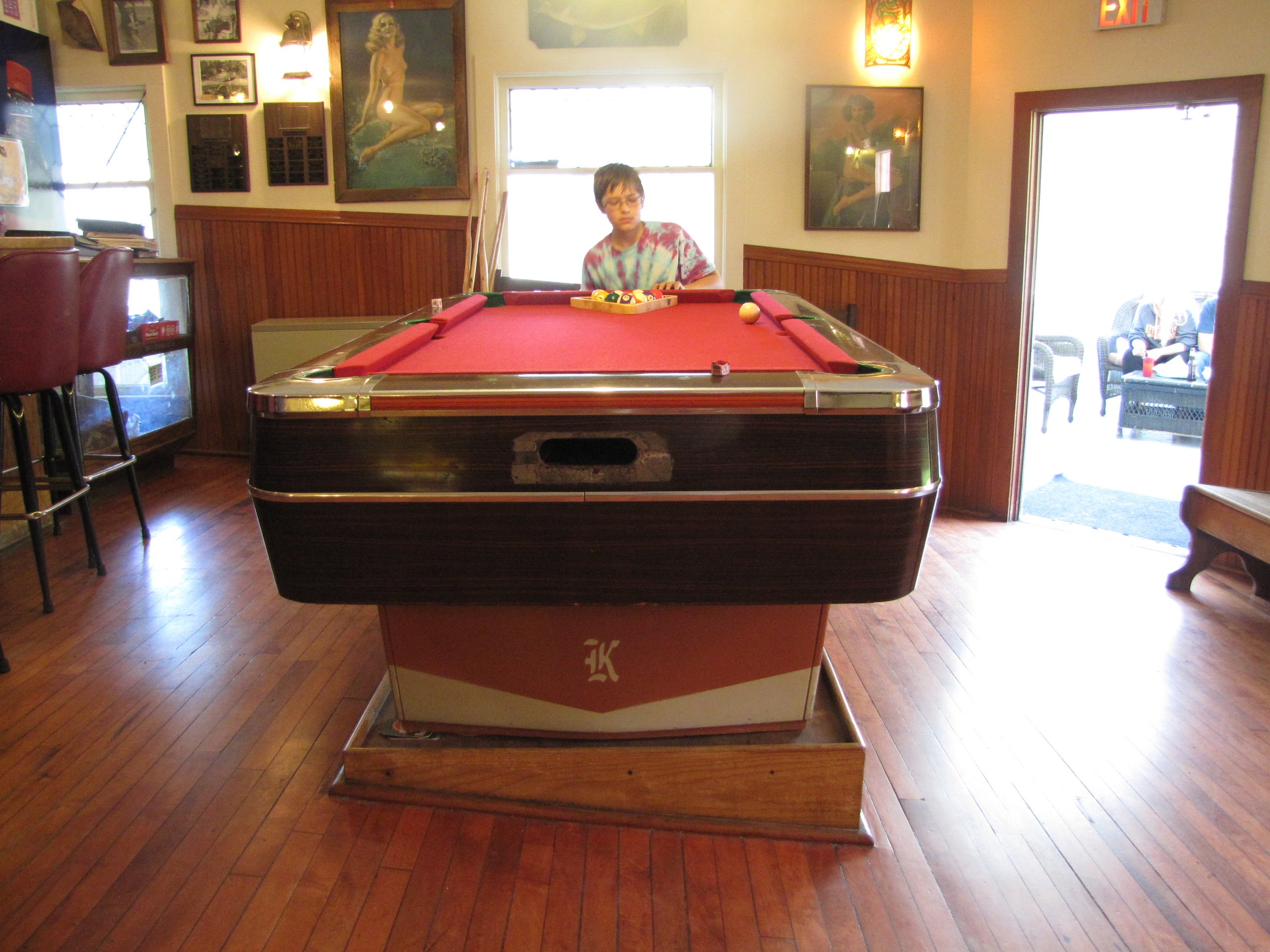 This pool table at Kettle Falls MN. The floor in the bar room is sloped