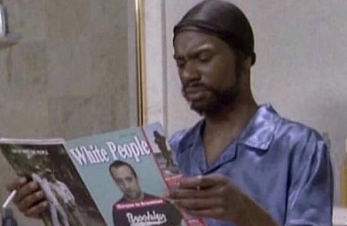Picture of president Teddy Roosevelt reading "The Jungle" by Upton