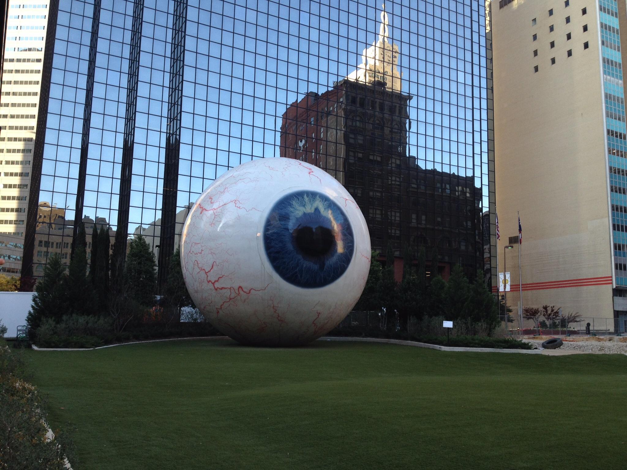 This giant statue of an eyeball hidden behind a building complex in