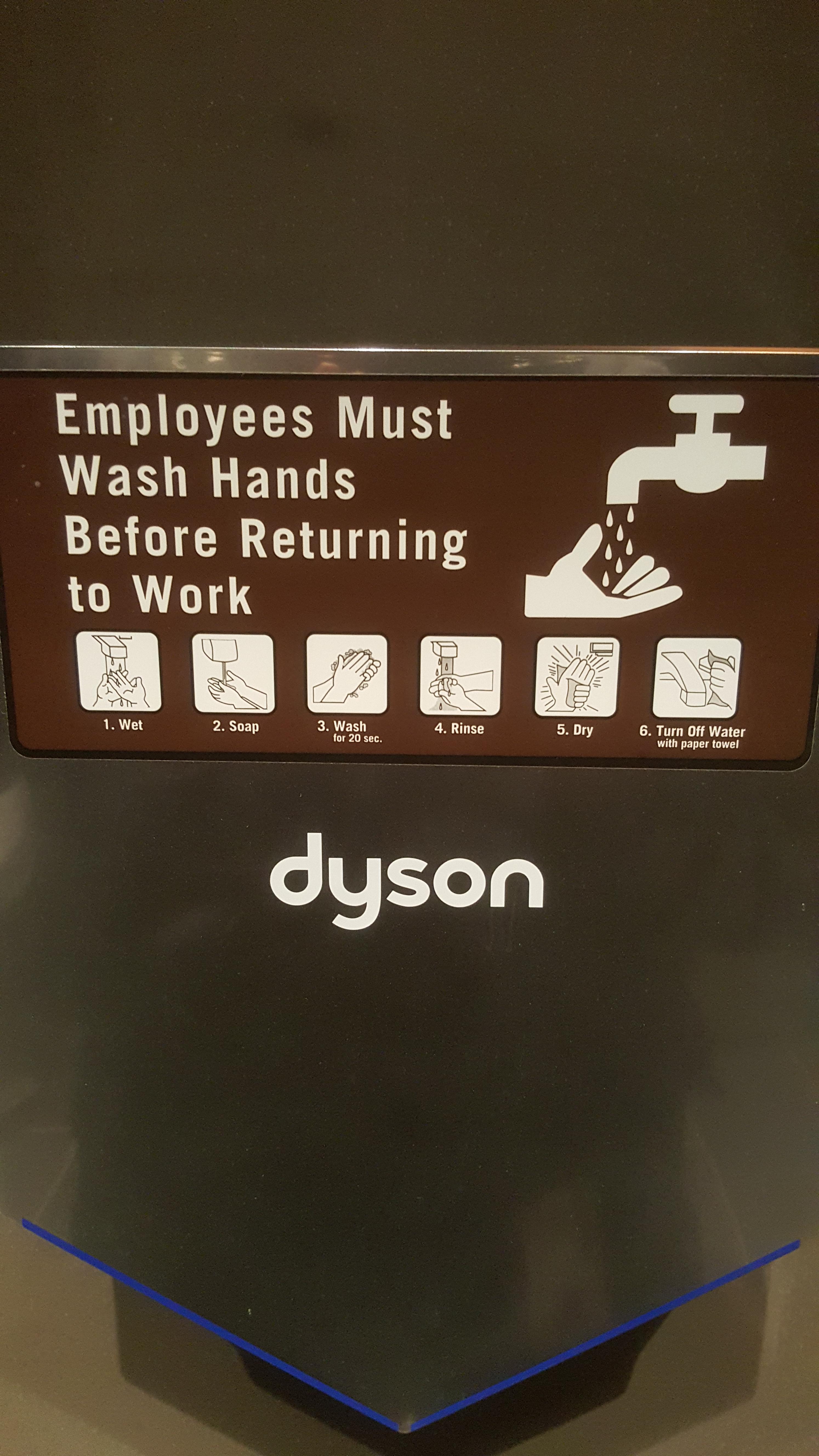This Dyson hand dryer tells you to turn off the water with the paper towel it's trying to
