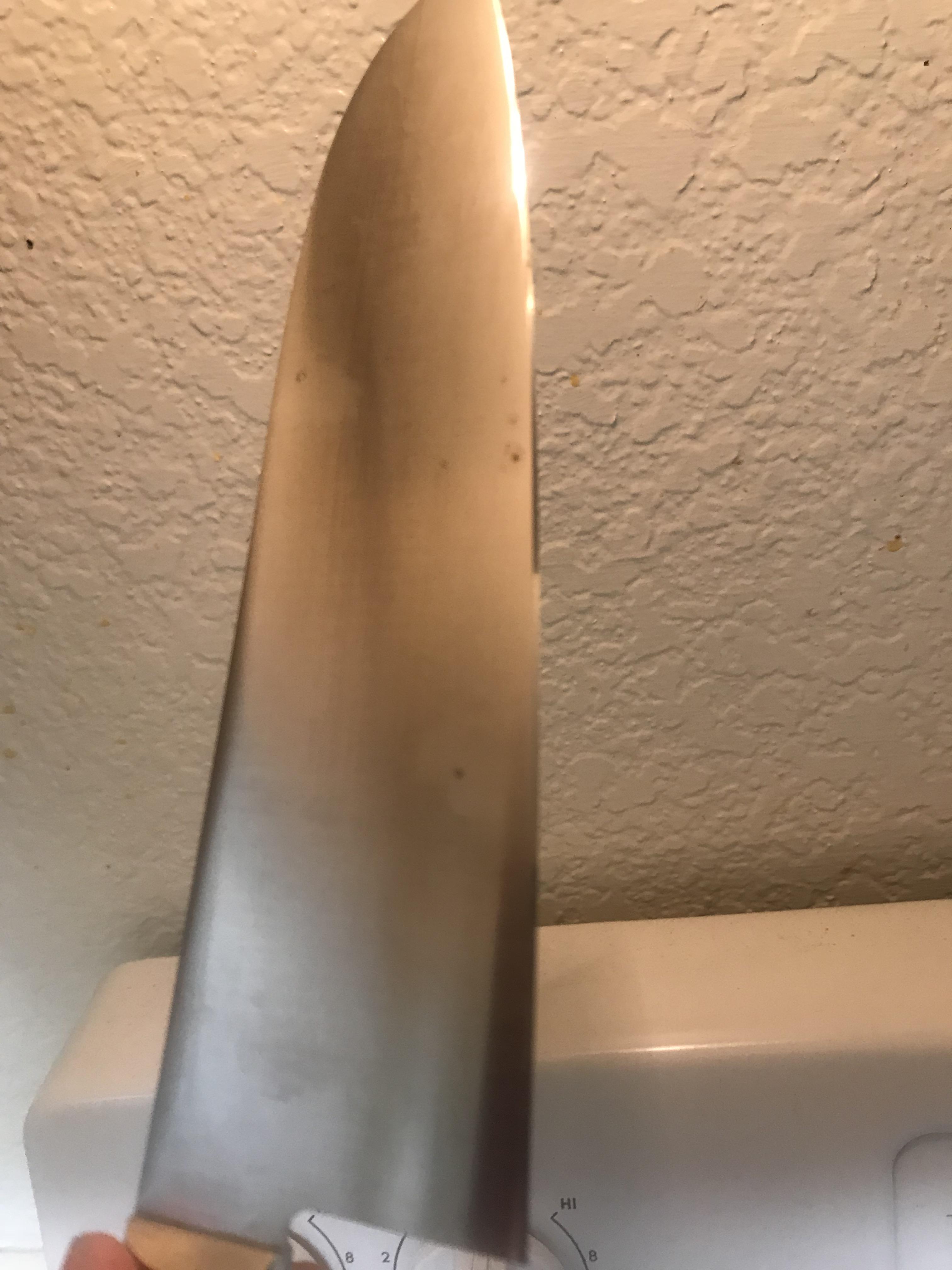 Stainless steel knife—rust spots? Dried and stored on a wooden strip