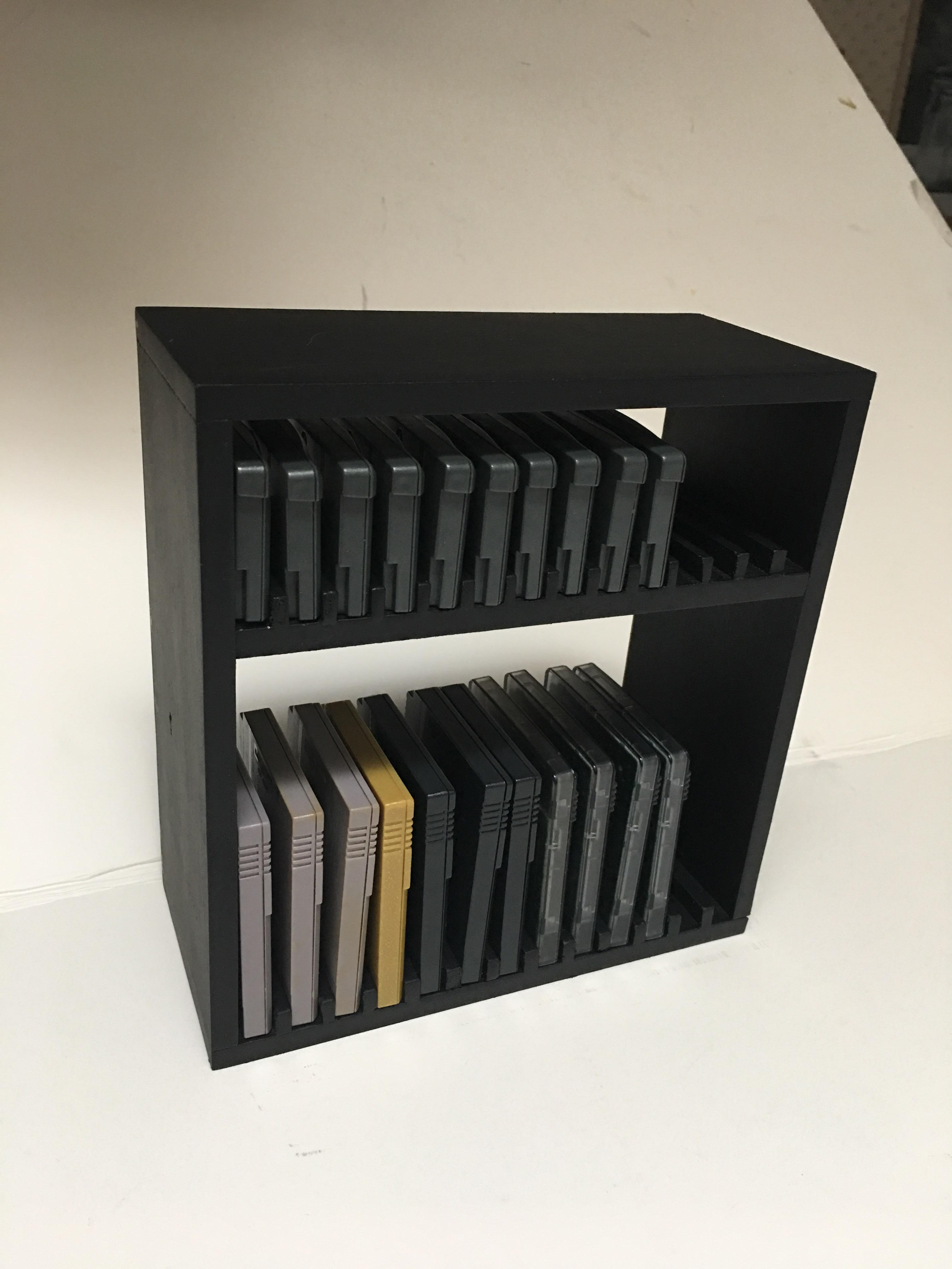 Made a little wooden holder for my small collection of GB, GBC and GBA