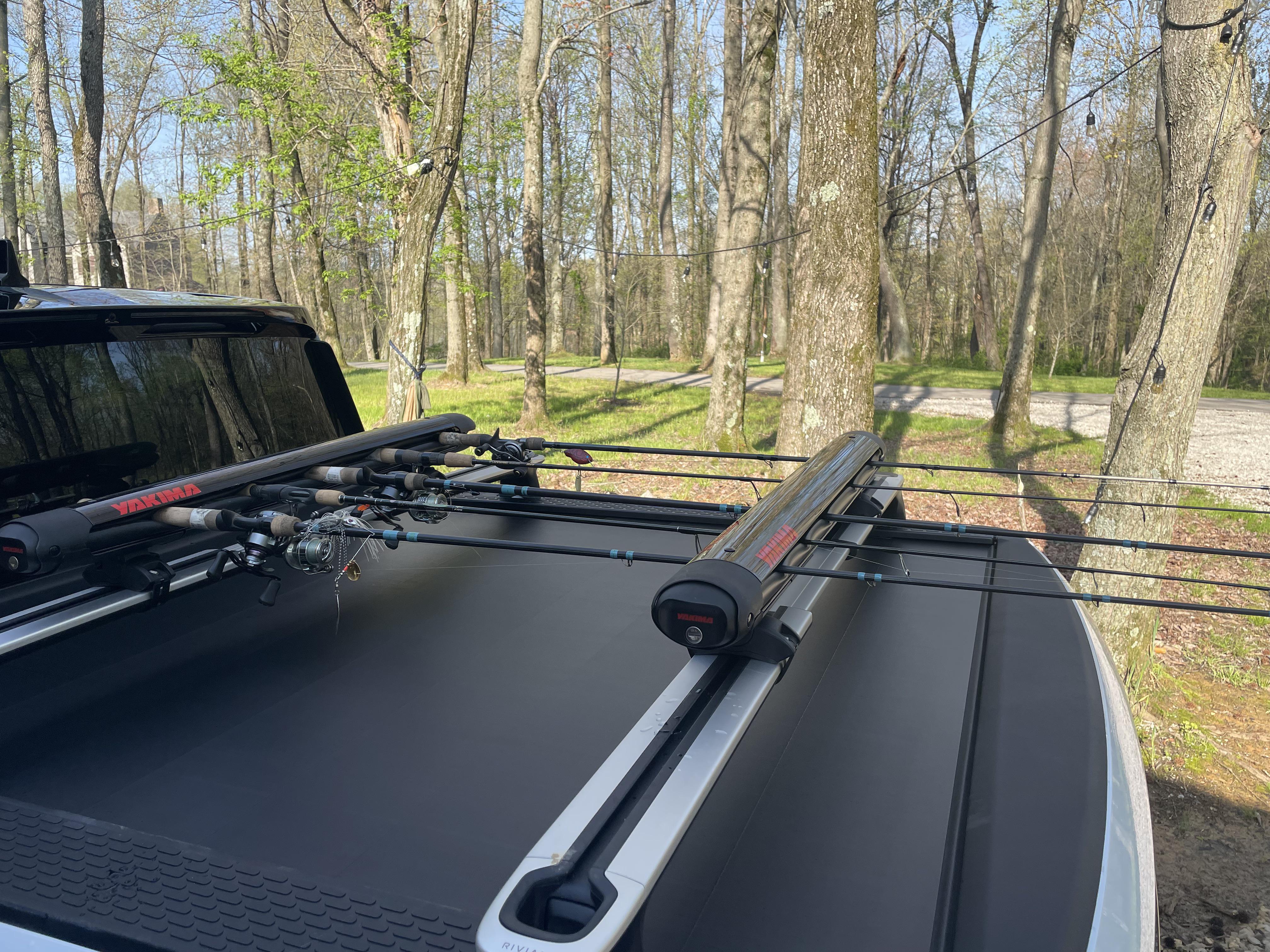 The Yakima ski rack doubles as an excellent fishing rod rack r/Rivian