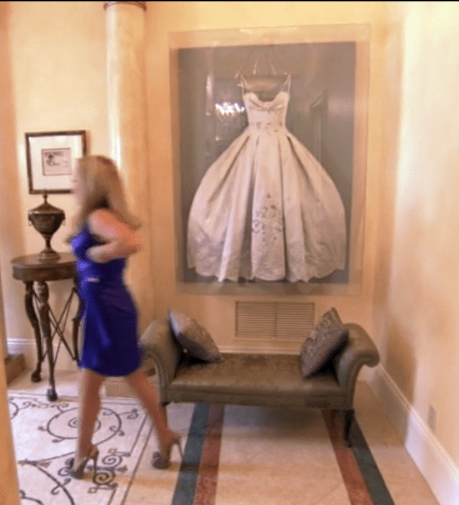 I like how Adrienne Keeps i think Her wedding Dress Framed. Smart Idea