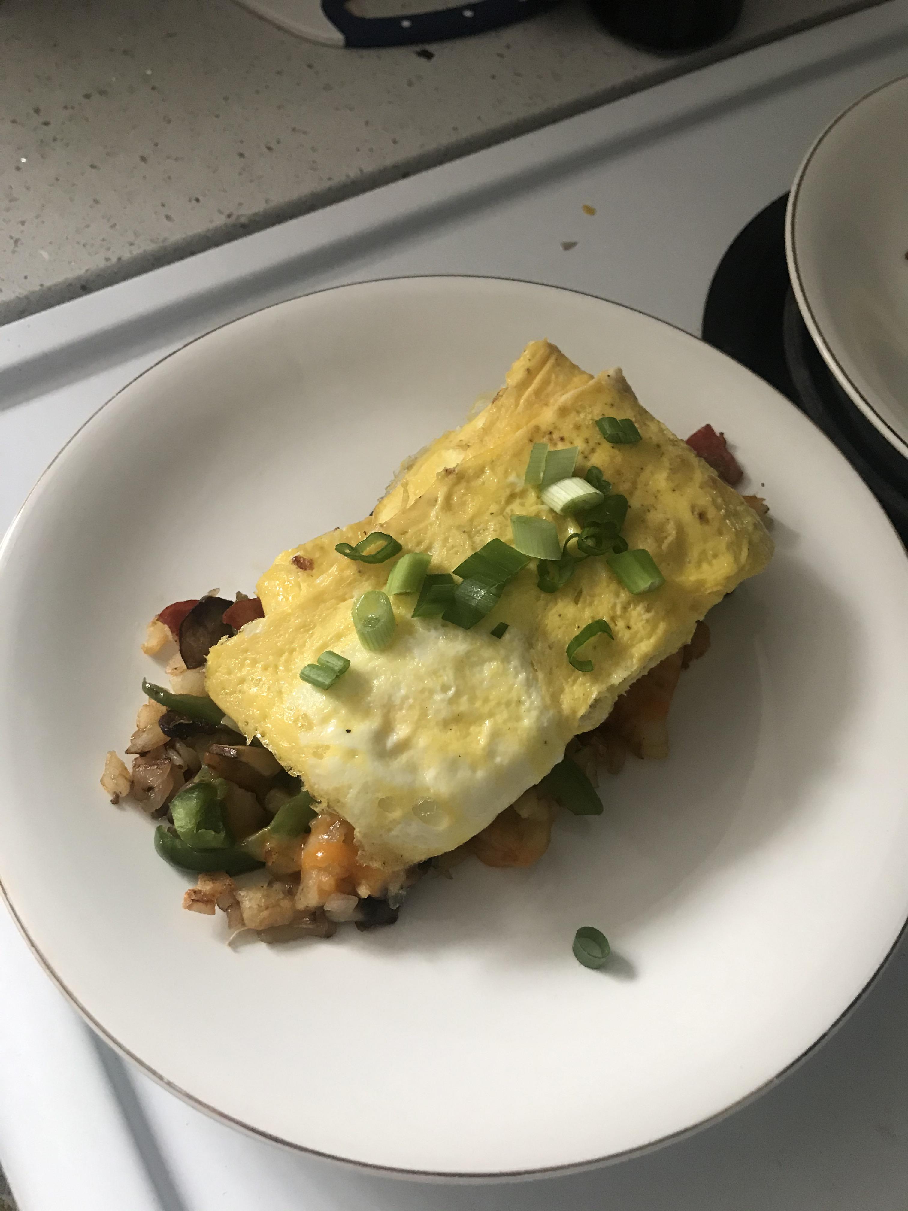 [Homemade] Breakfast Skillet with hash browns, mushrooms, onions and cheesy scramble. r/food