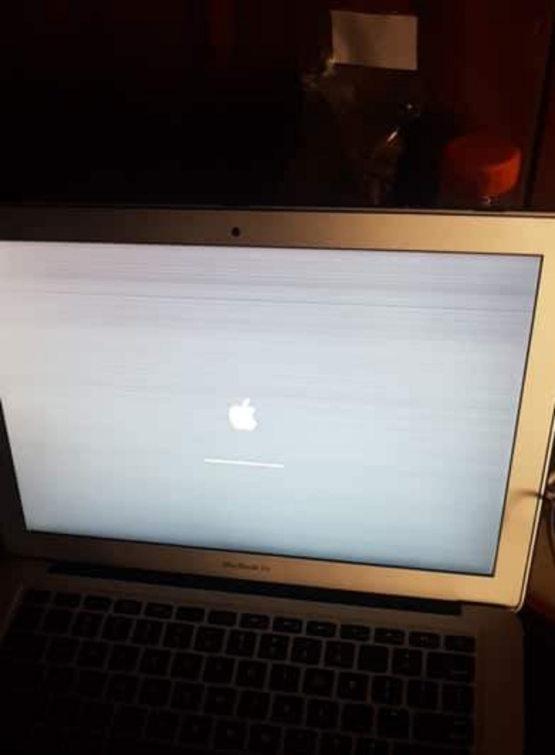 My Early 2015 Macbook Air's screen is ghosting and is littered with