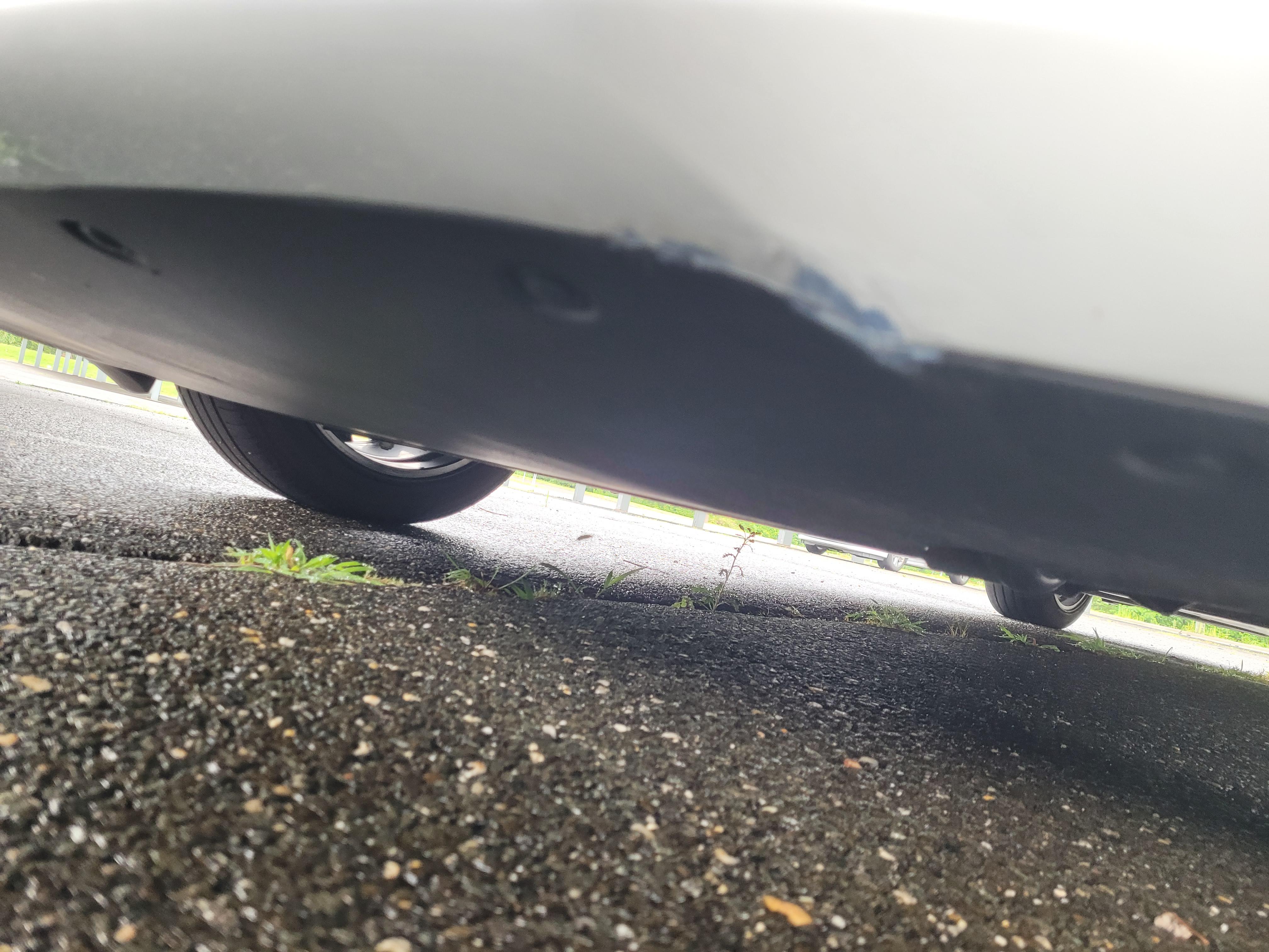 Hi scraped bottom of front bumper on a driveway.. Anybody have any ideas to cover up.. Doens't