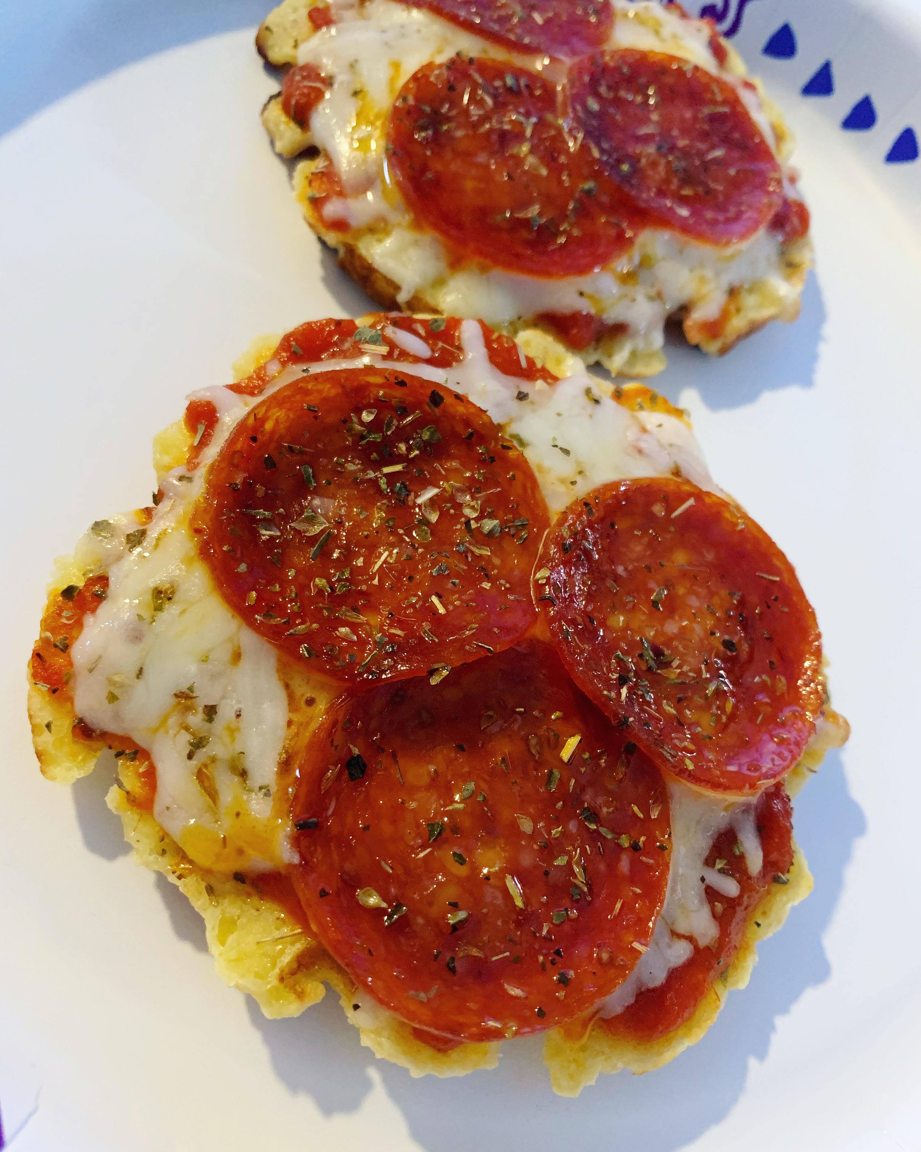 Chaffle pizza. I cut one chaffle in half to make the “crust” thinner