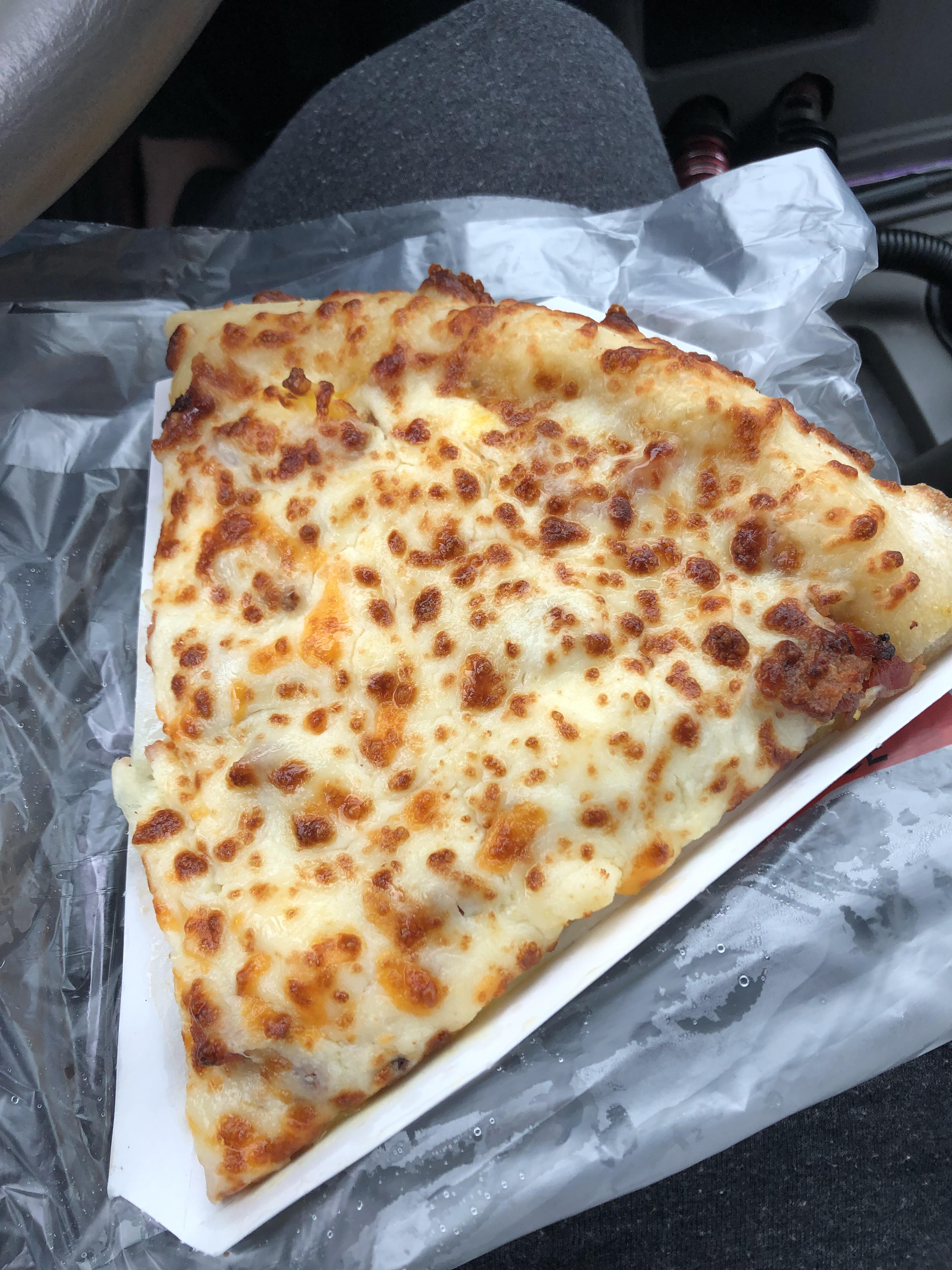 A slice of Casey’s breakfast pizza r/FoodPorn