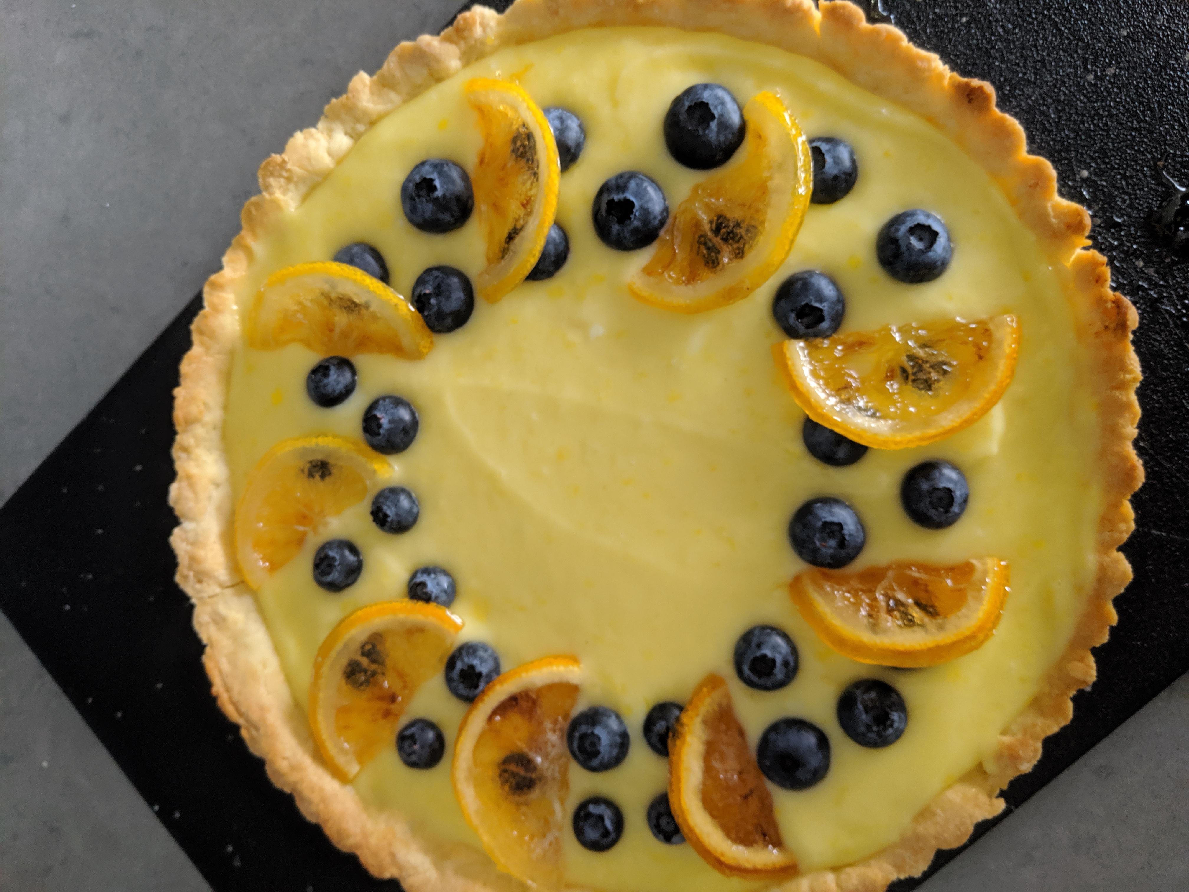 [Homemade] Lemon tart topped with blueberries and candied lemon r/food