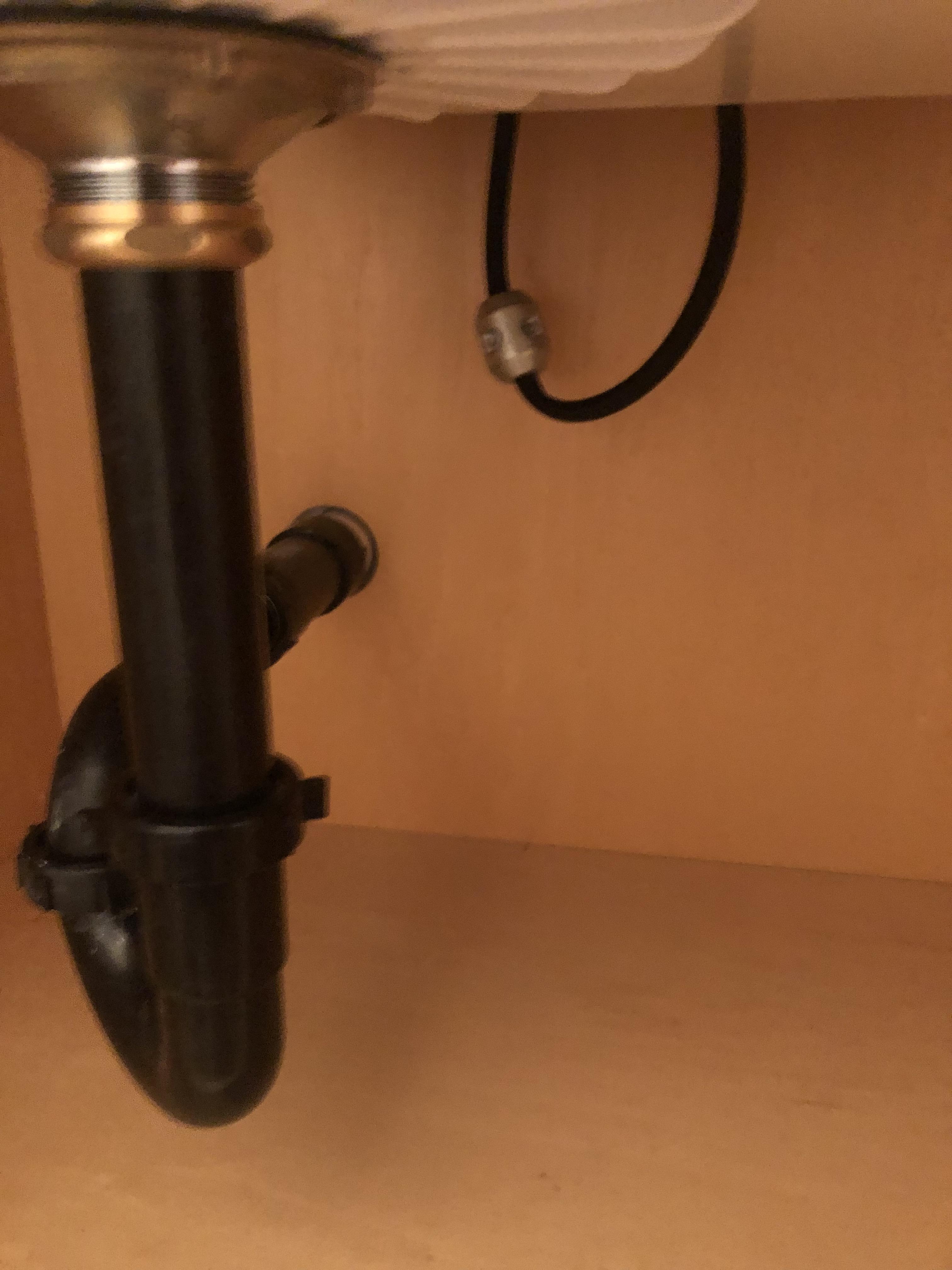 Hey plumbers that chord hanging in the back, does it need to hang