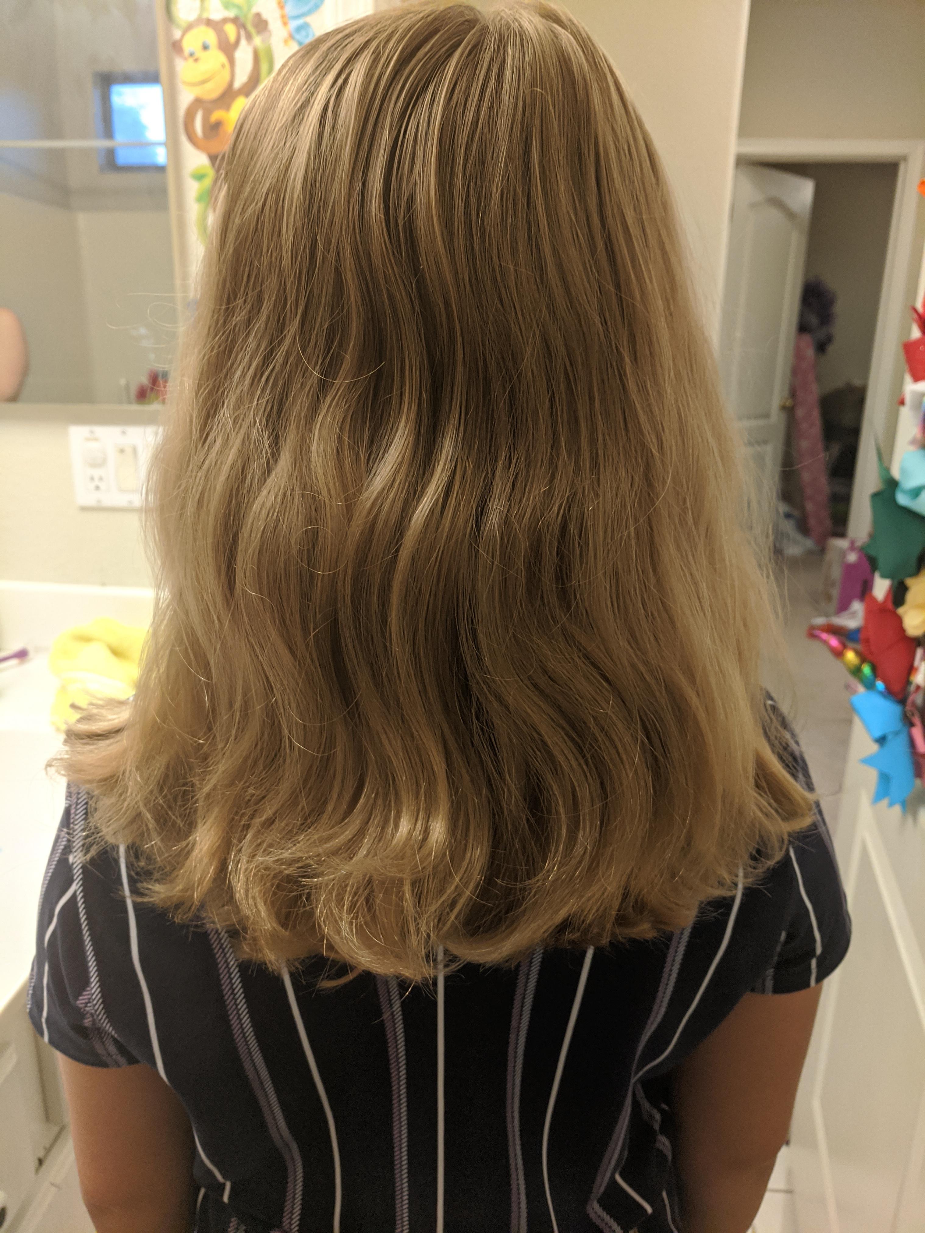 Any advice at all for my daughter's hair? It just seems so dry and bushy after brushing. Tangles