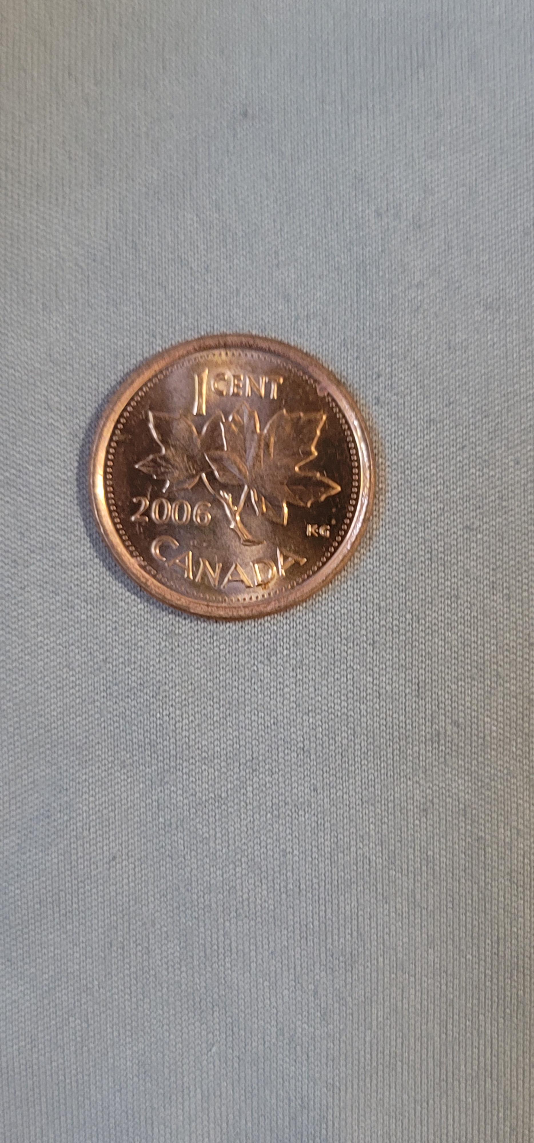 Using acetone on Canadian coins with color to treat pvc damage