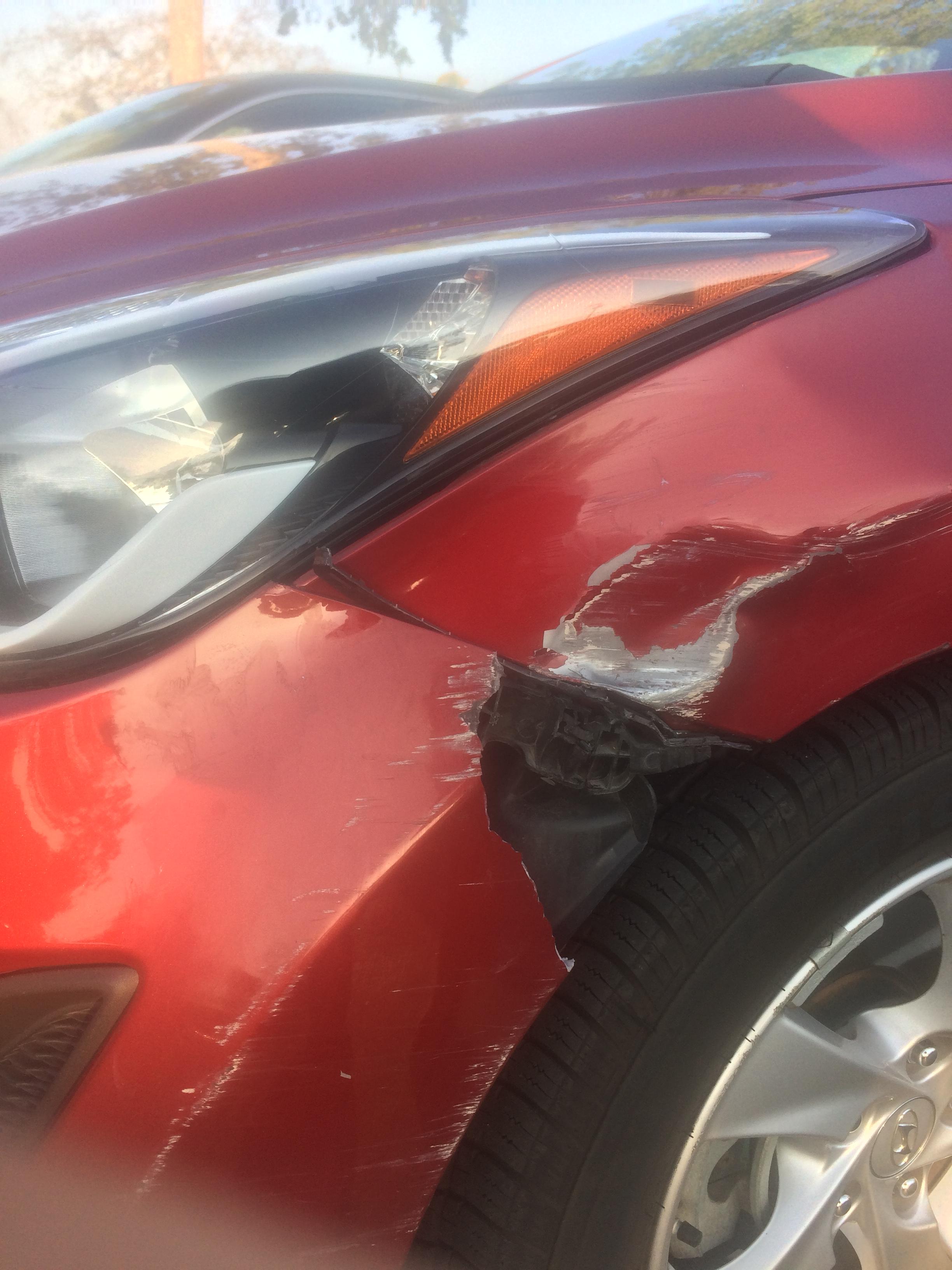 Scraped the left side of my fender as I was pulling into the garage