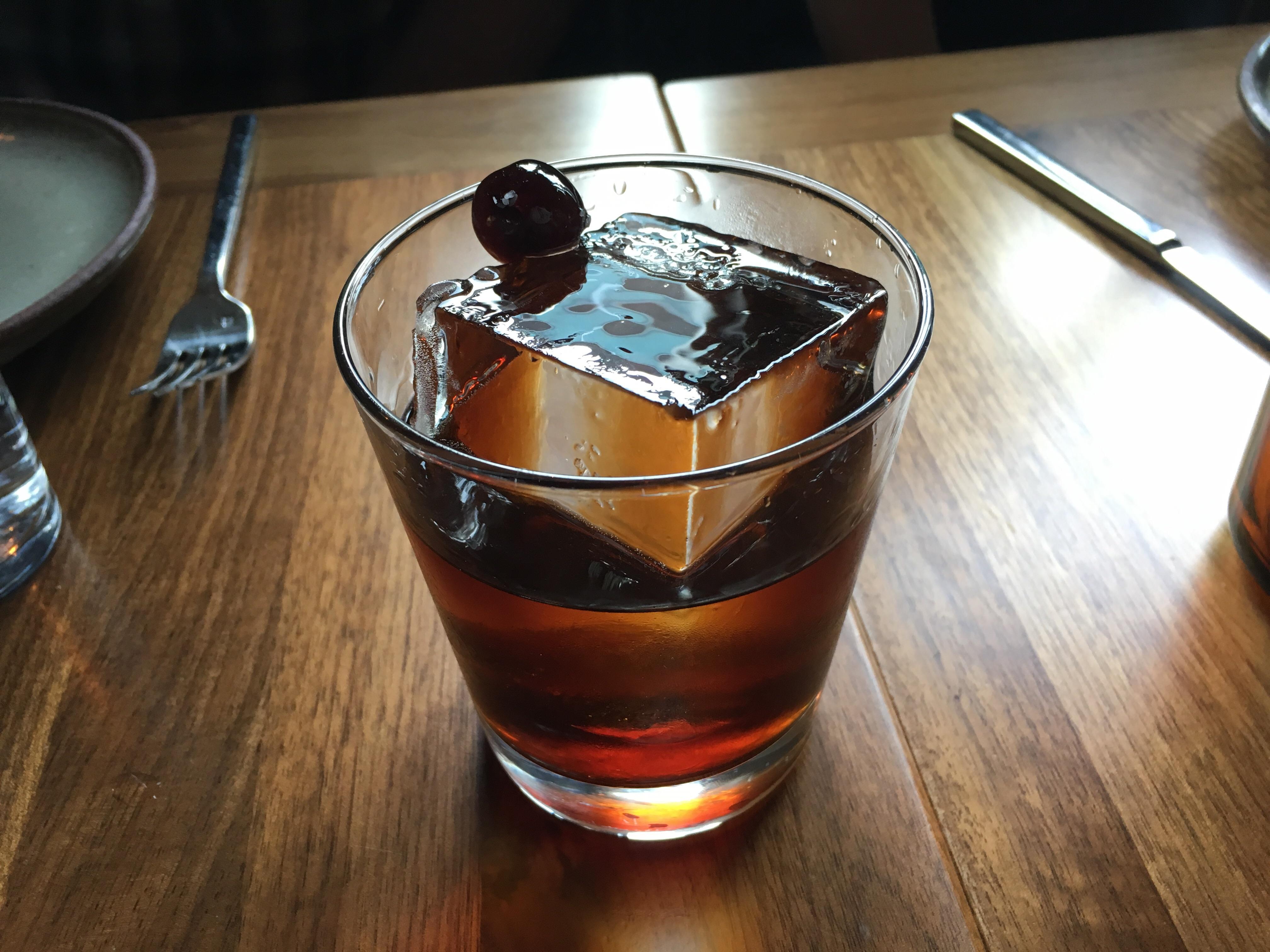 This big ice cube in my cocktail r/oddlysatisfying