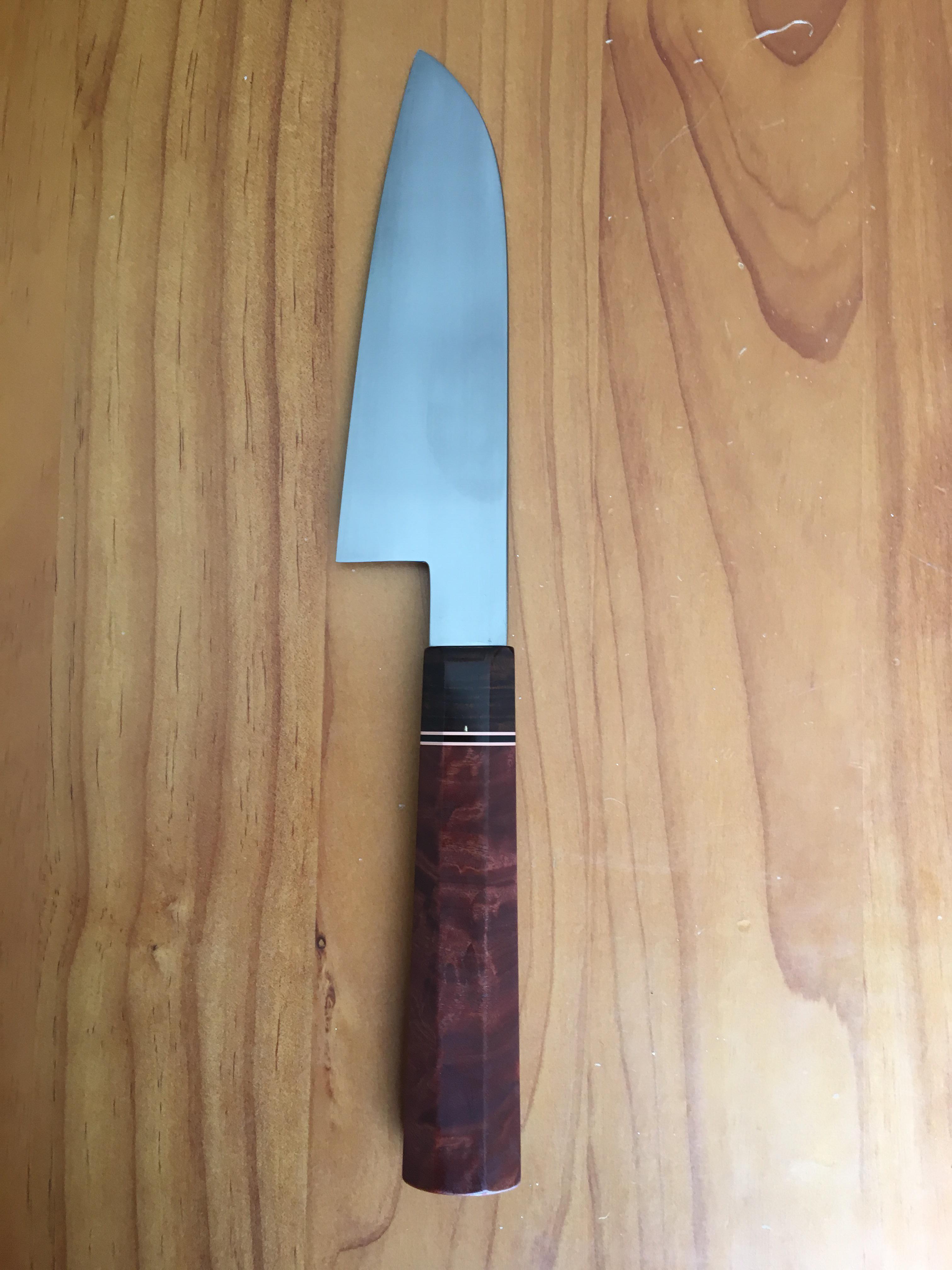 Just finished this 7 inch chef knife. Steel is 1084, handle is red gum