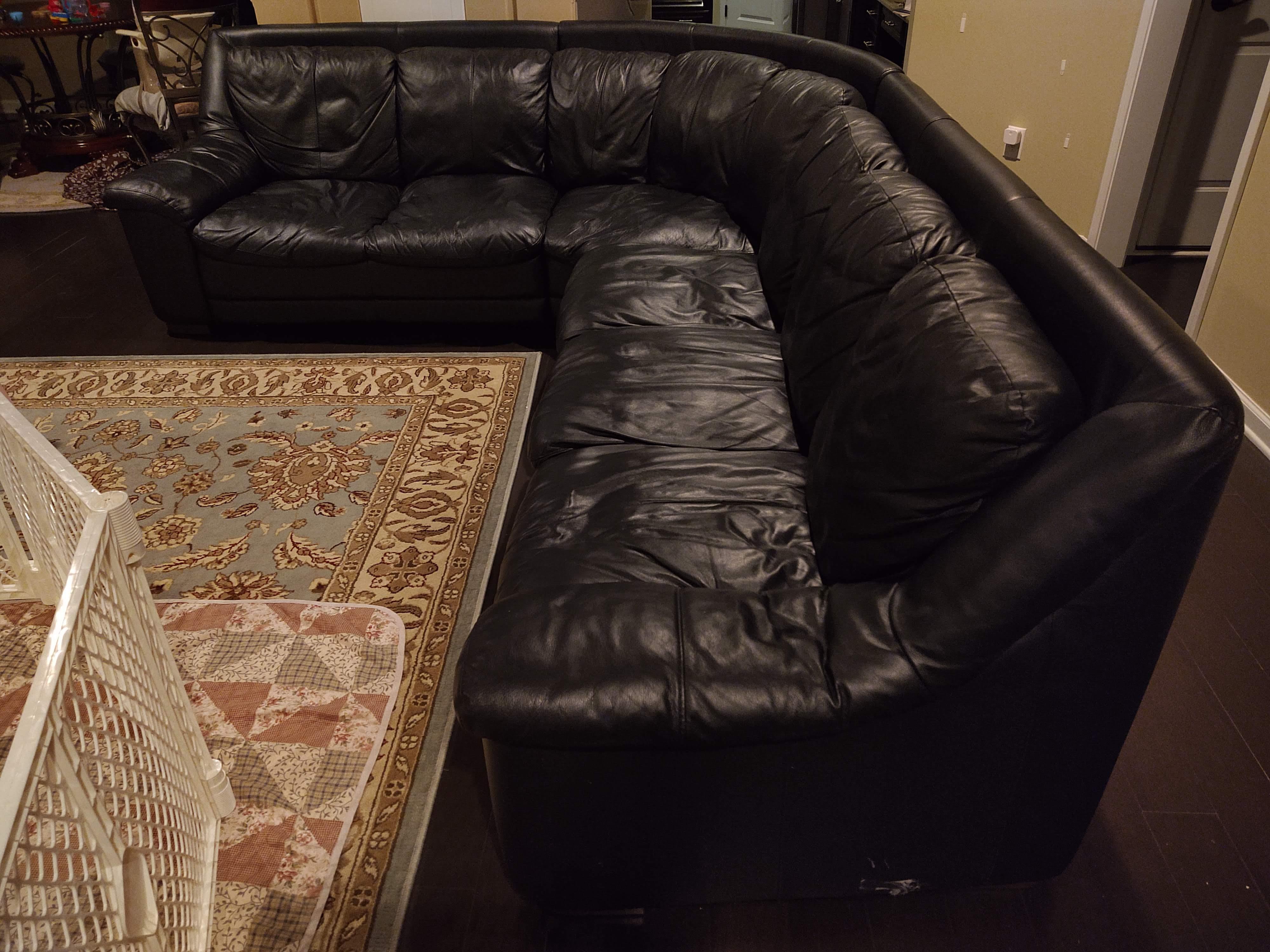 Black leather Sectional. 100. Must pick up by May 6th r/raleigh
