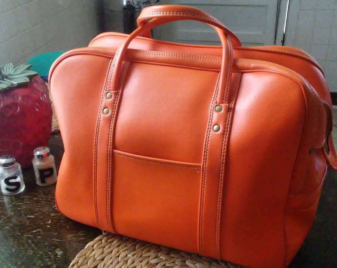 Just found this orange carry on at an estate sale! r/vintage