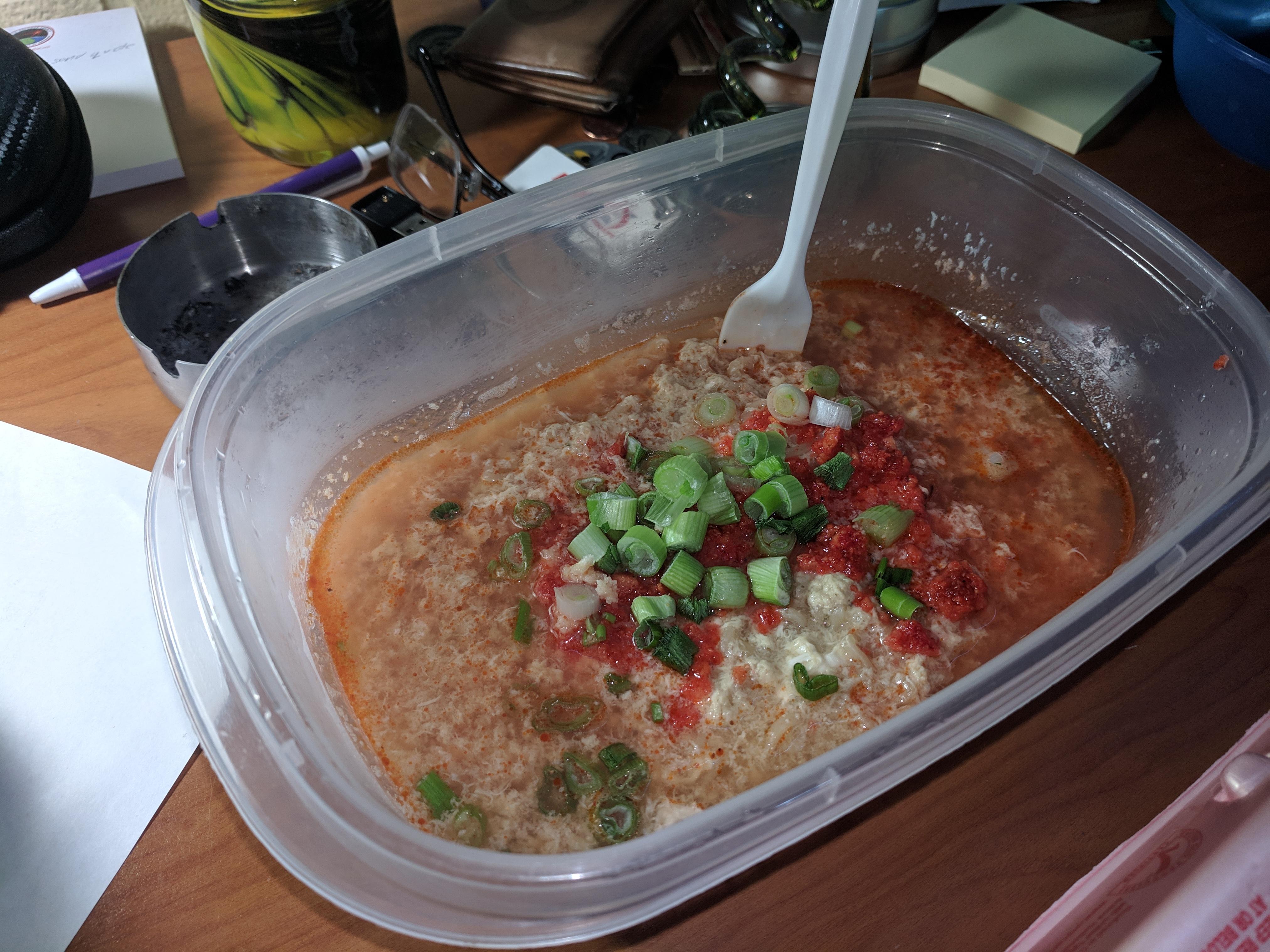 Egg drop ramen with crushed Takis and green onion garnish shittyfoodporn