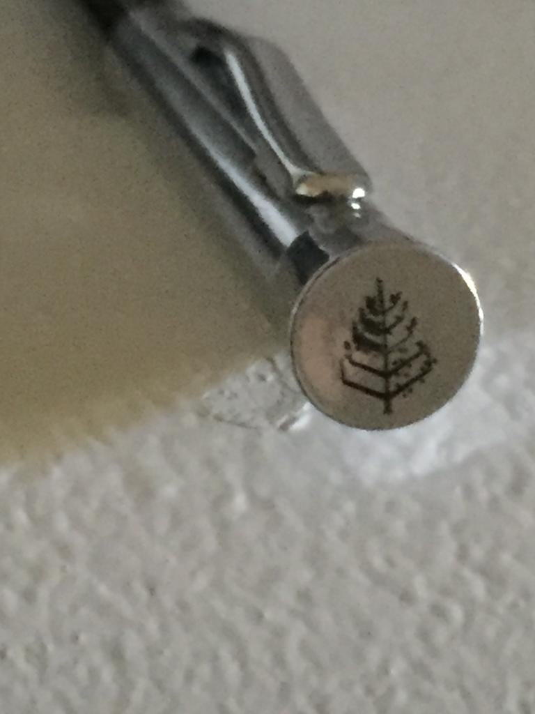 What does the symbol in this pen mean? r/Symbology