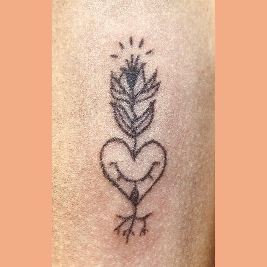 a flower growing thru adversity — first tattoo, on an inner bicep 🌷 💧11rl + 1.5 hours 💘 ig
