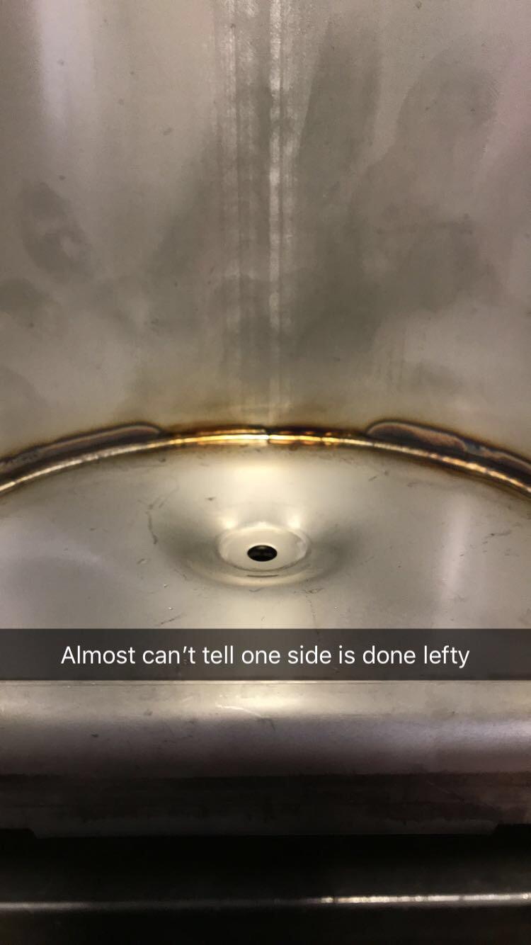 Inside tig weld of stainless pans for ham press rack. Welded left/right