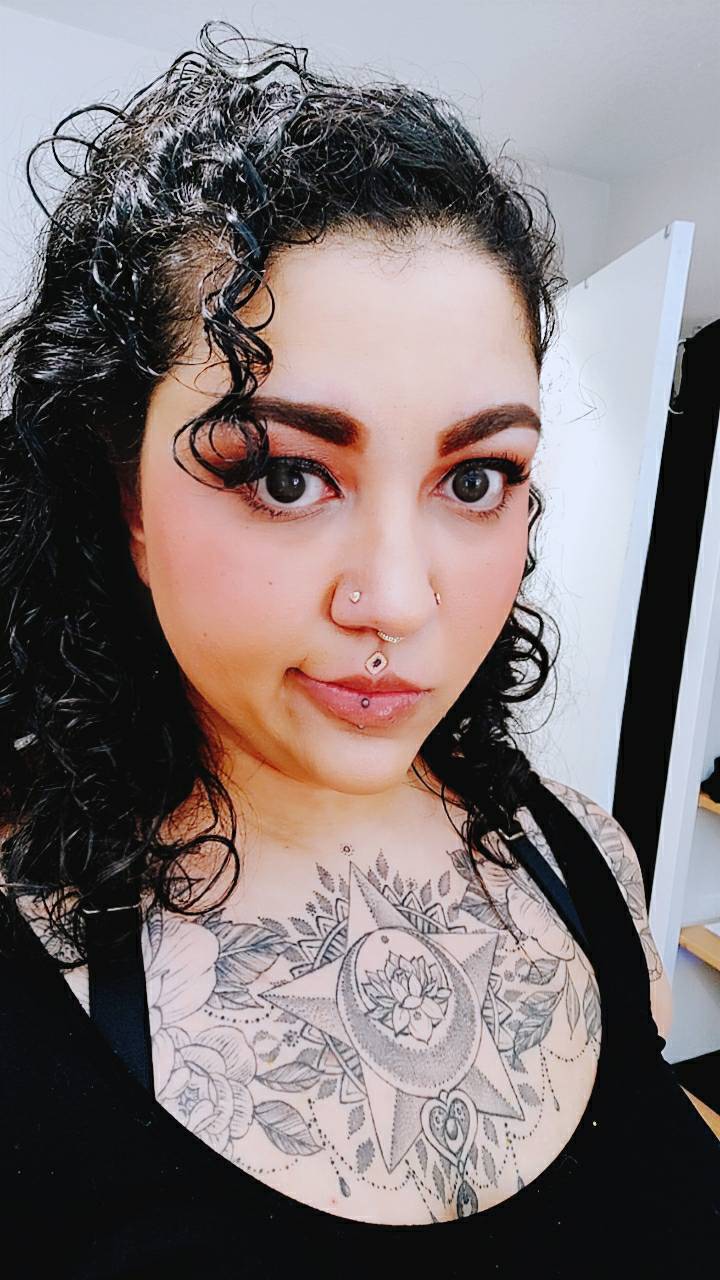 New bilateral nostril piercings with 14k rose gold Tether studs. r