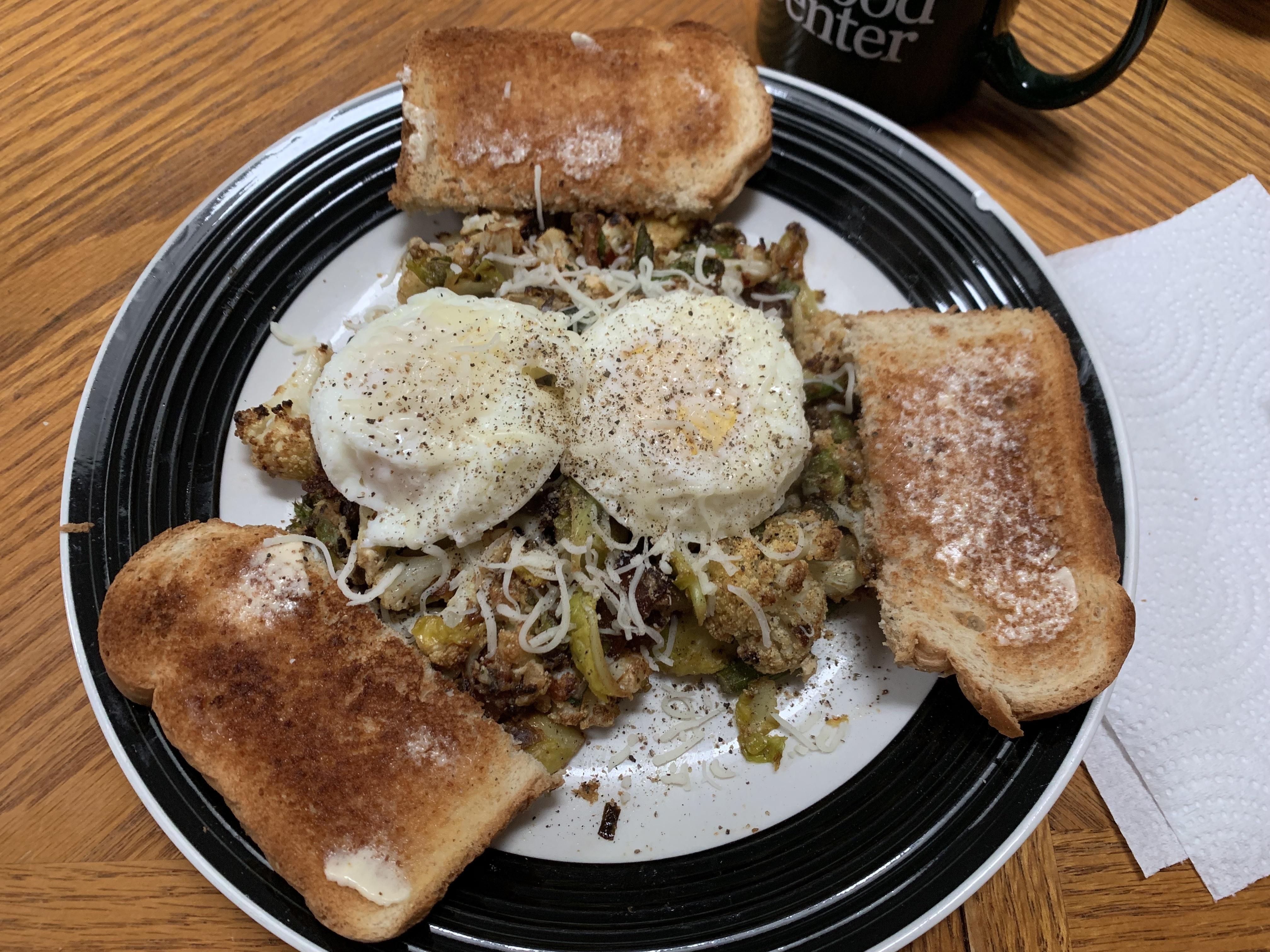 “Healthier” hash and eggs! Eggs are steamed instead of fried, and hash uses baked cauliflower