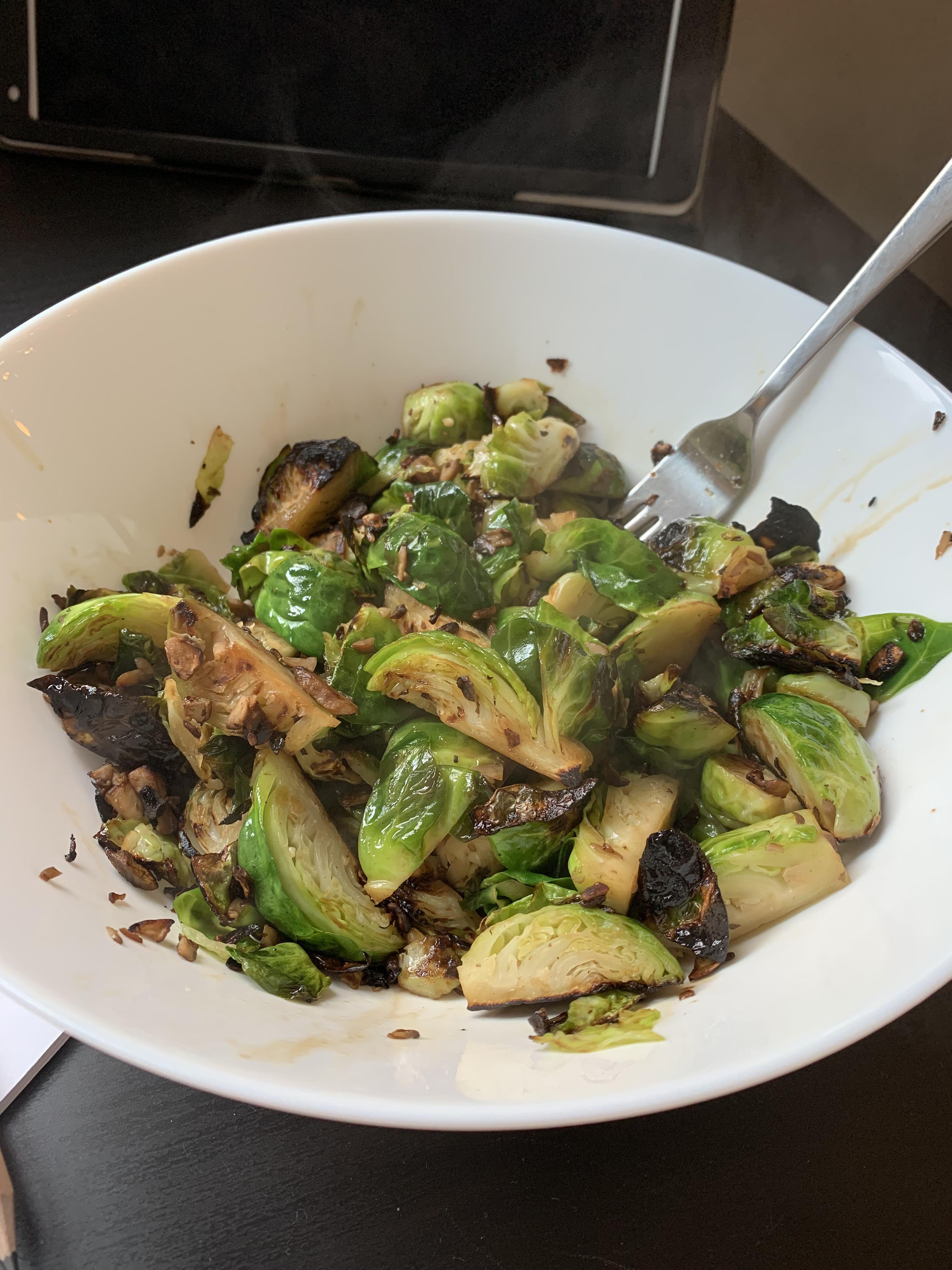 Pan roasted Brussels sprouts and finely chopped mushrooms with sesame