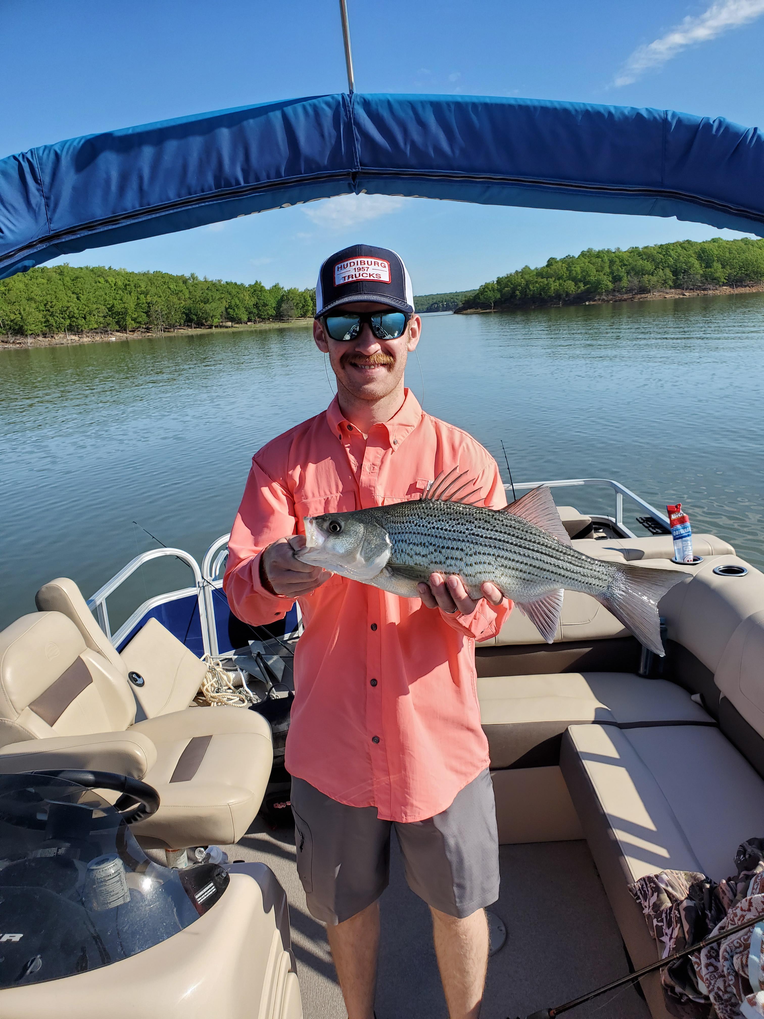 First striped bass! Caught on minnows at Lake Skiatook. 4lbs r