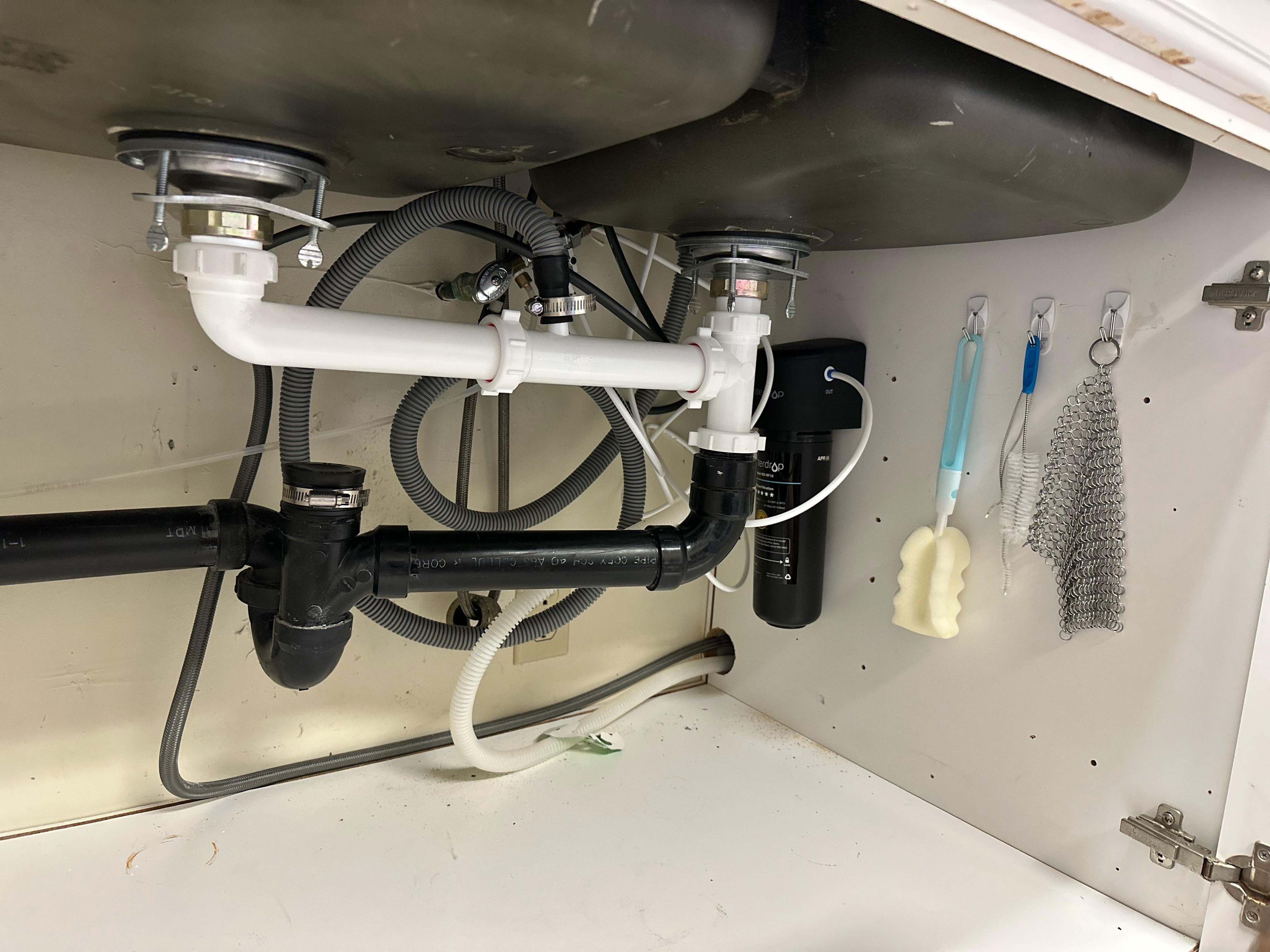 Let me have it… dishwasher hose (white)goes to air gap and then (gray