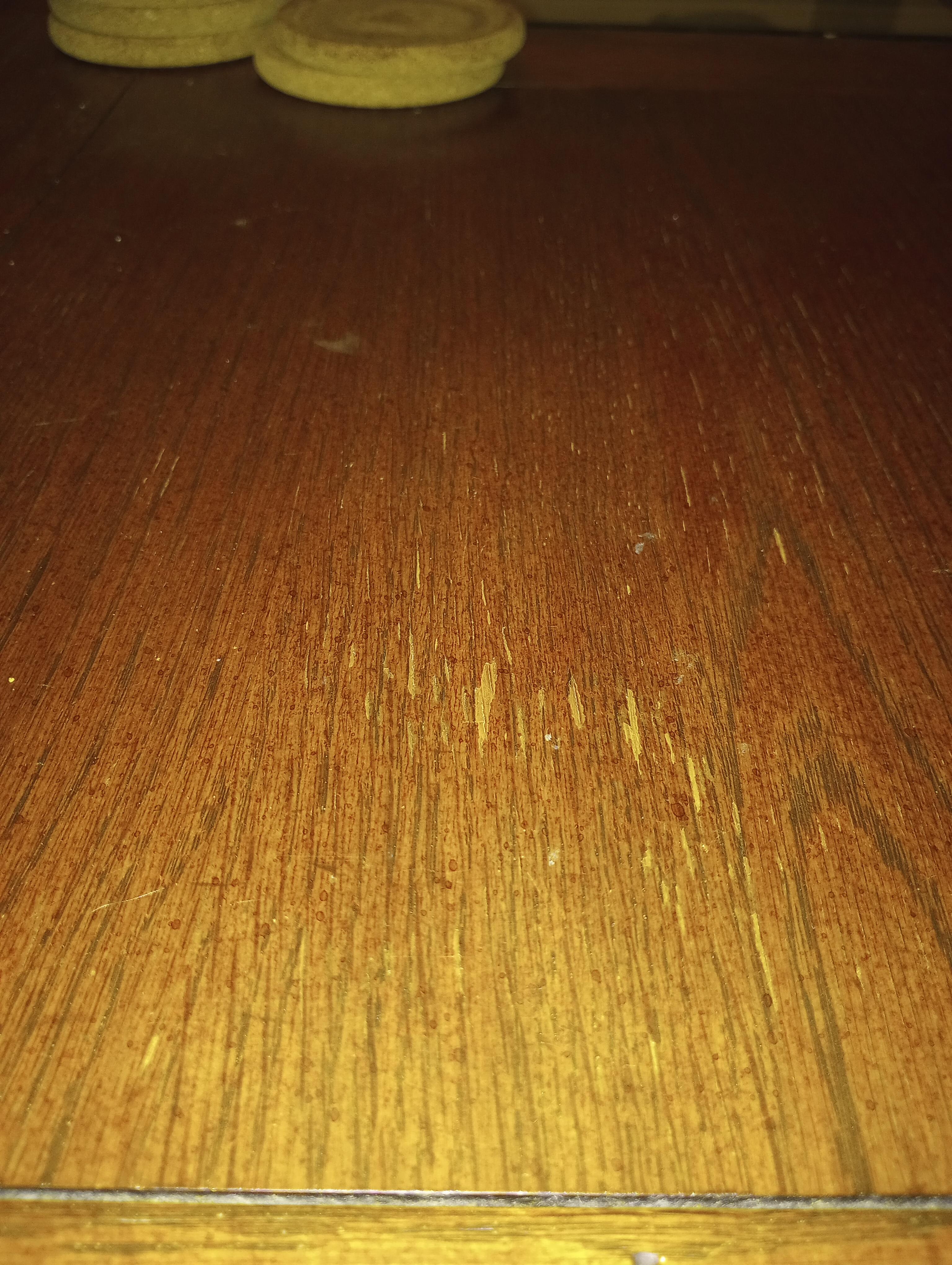 Help with coffee table heat damage. What can I do beyond sanding and