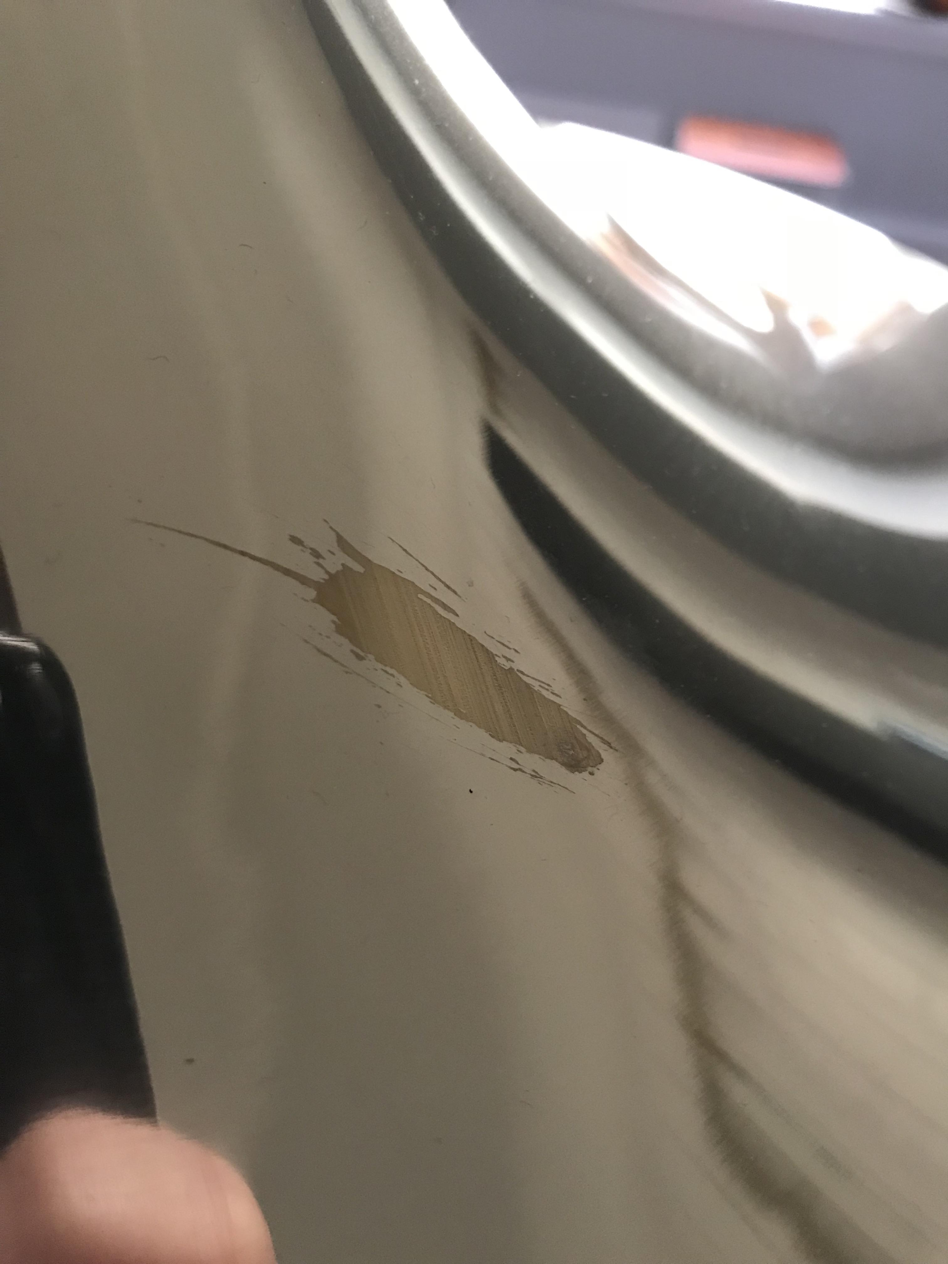 (Brass) Does this look like damage caused during production? r