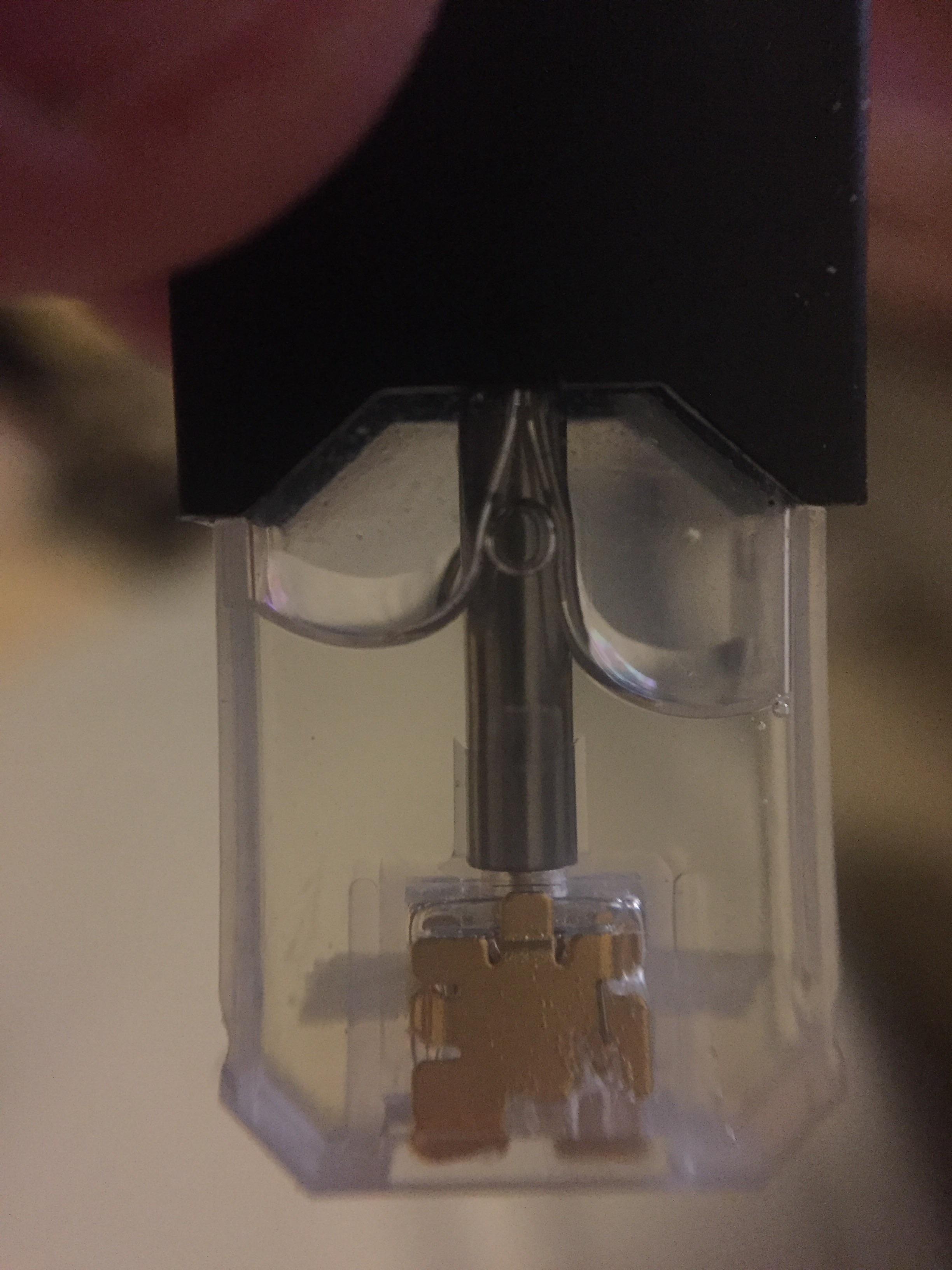 Macro of a mint juul pod r/juul