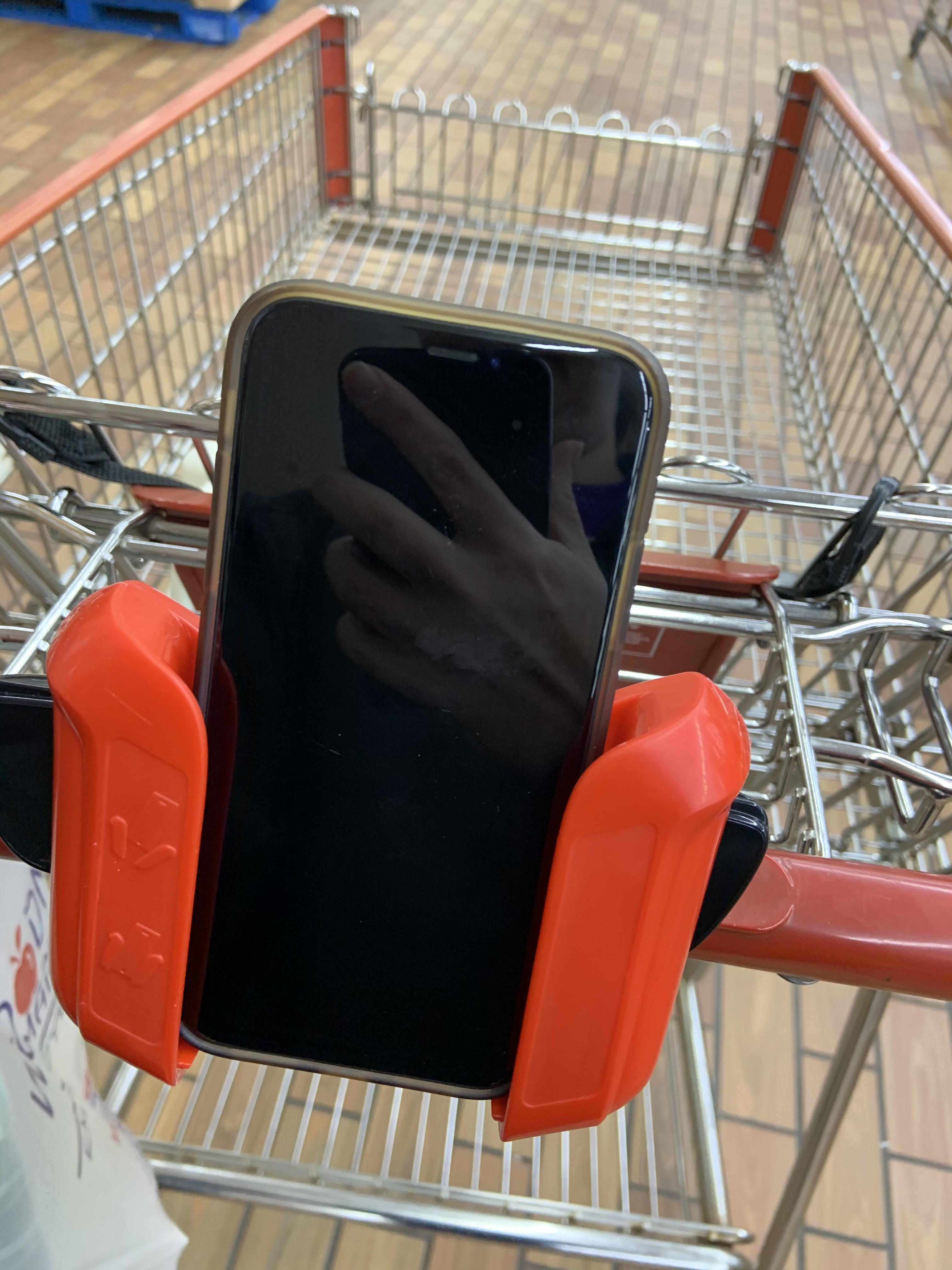 Grocery store cart has an adjustable phone mount so your digital