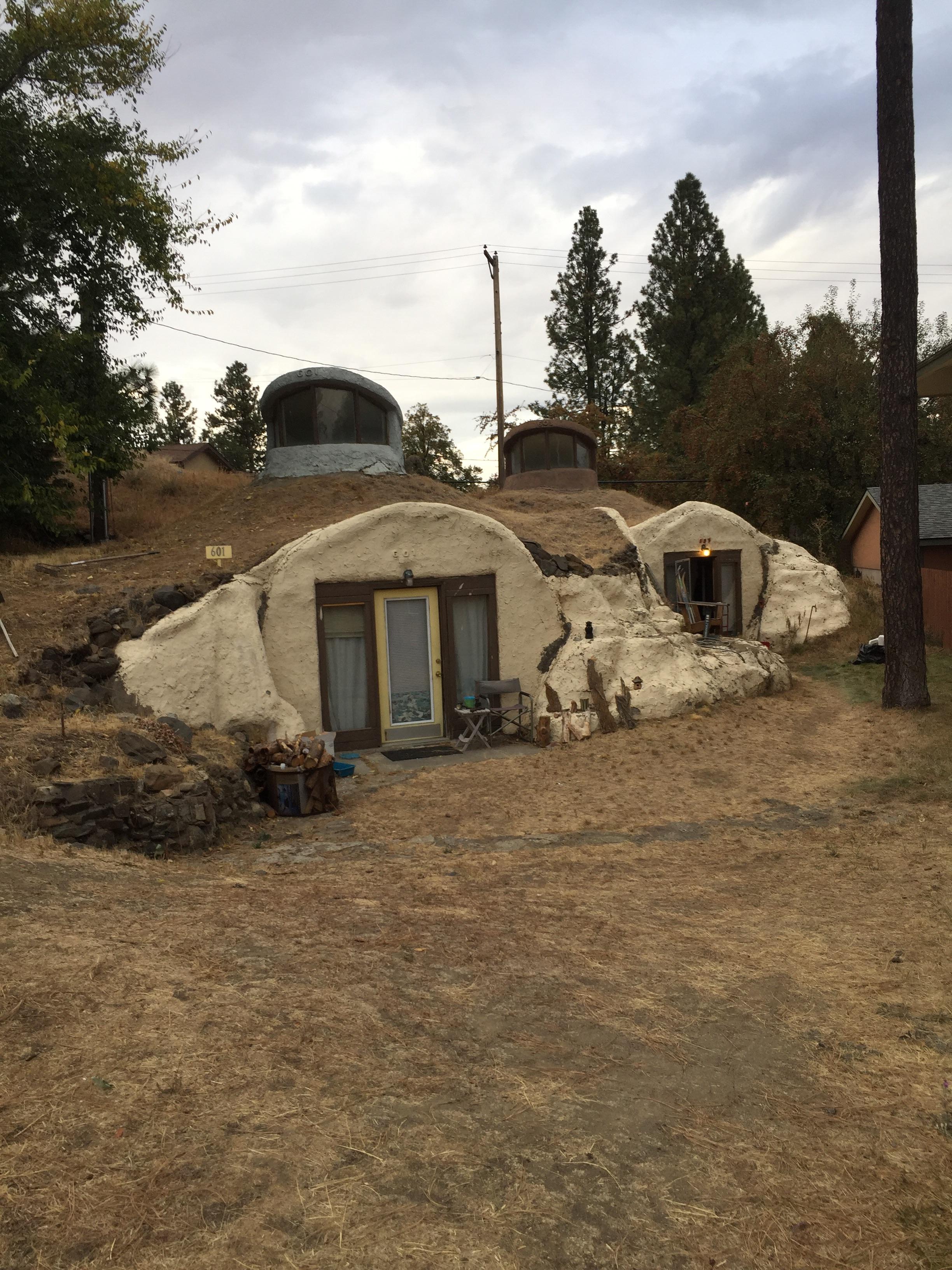 These Hobbitlike houses. Surrounded by normal development in the