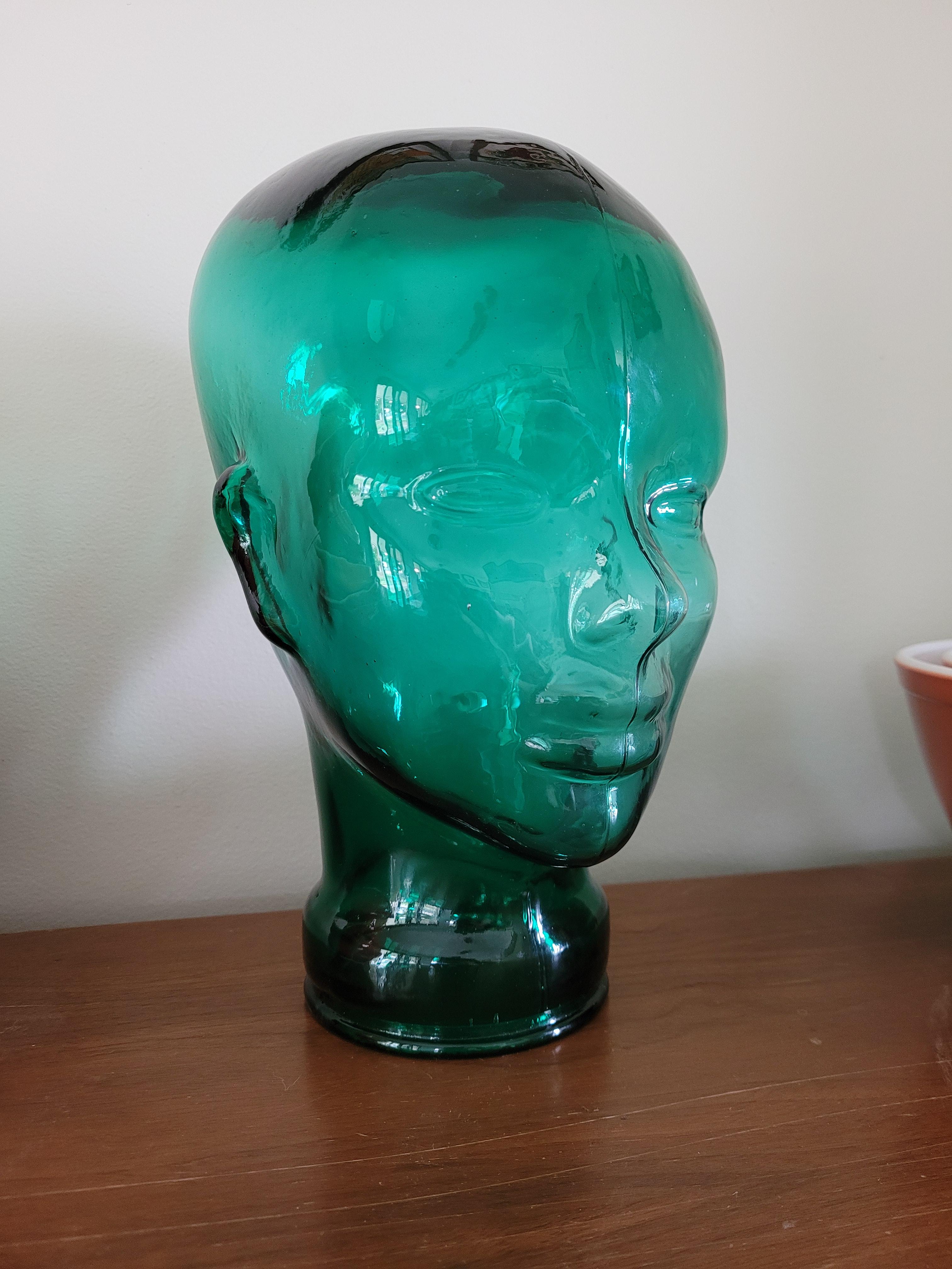 Green glass head. Not sure why I needed it, but I couldn't pass it up