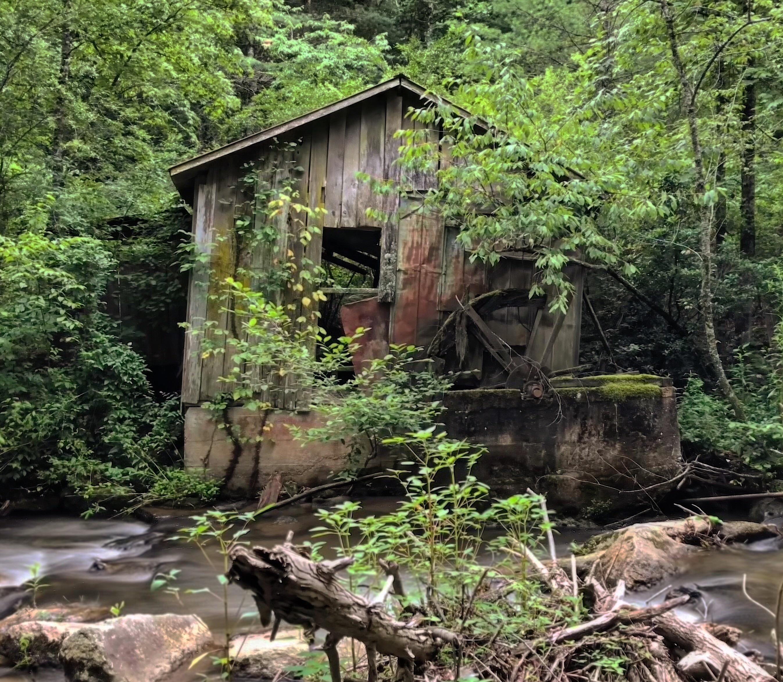 An abandoned mill in the woods of North [OC] [2694x2394] r