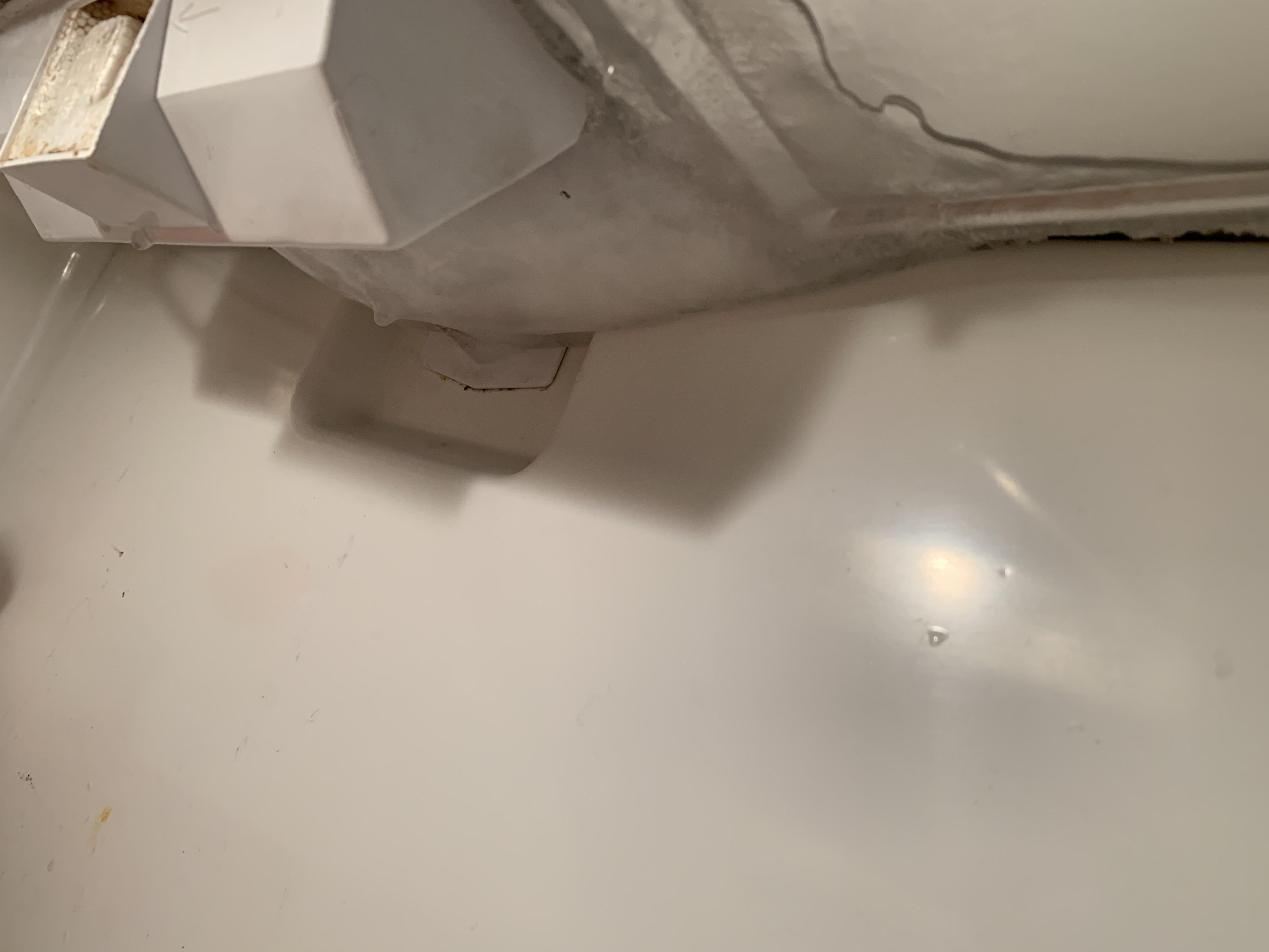 Ice buildup and condensation at the top of my fridge, the freezer is