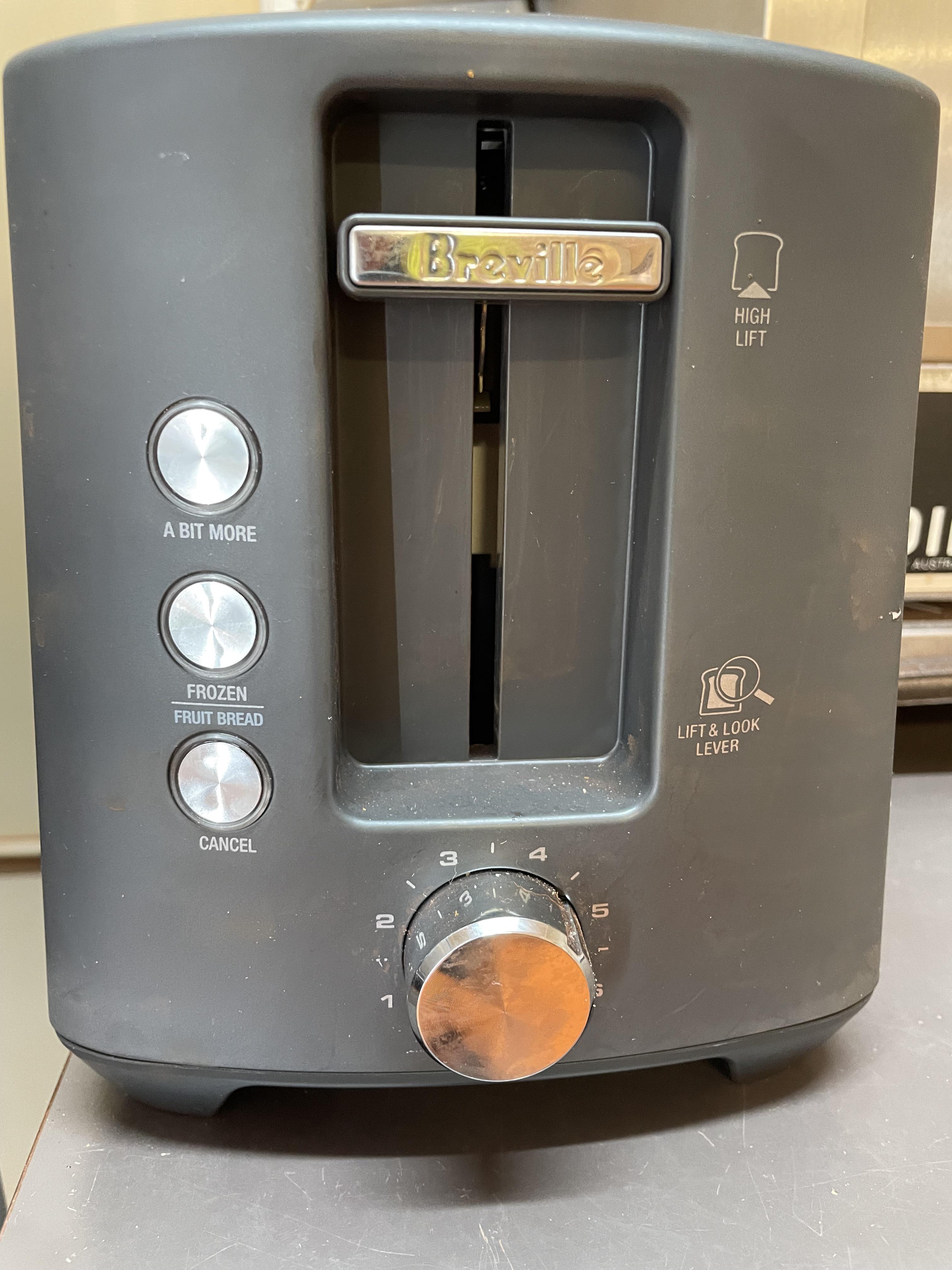 This toaster has “a bit more” button on it r/mildlyinteresting